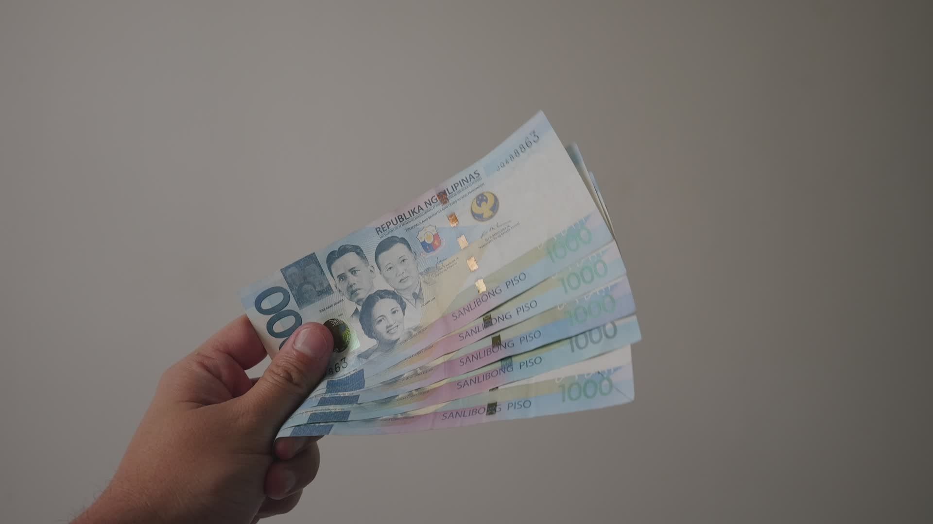 1920x1080 Hand Holding Philippine Peso Banknotes Free Stock Video Footage, Royalty Free 4K & HD Video Clip