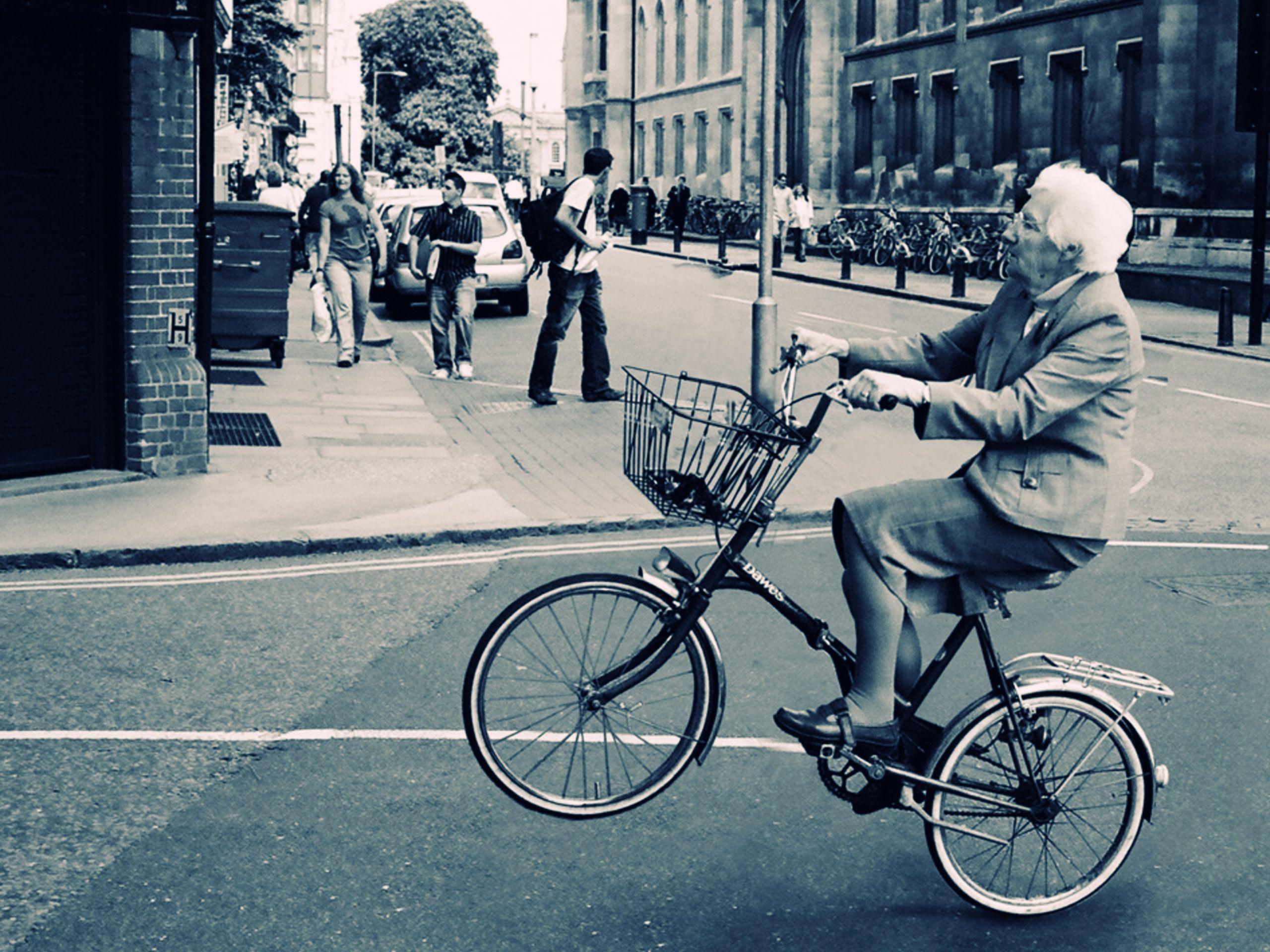 old woman on bike