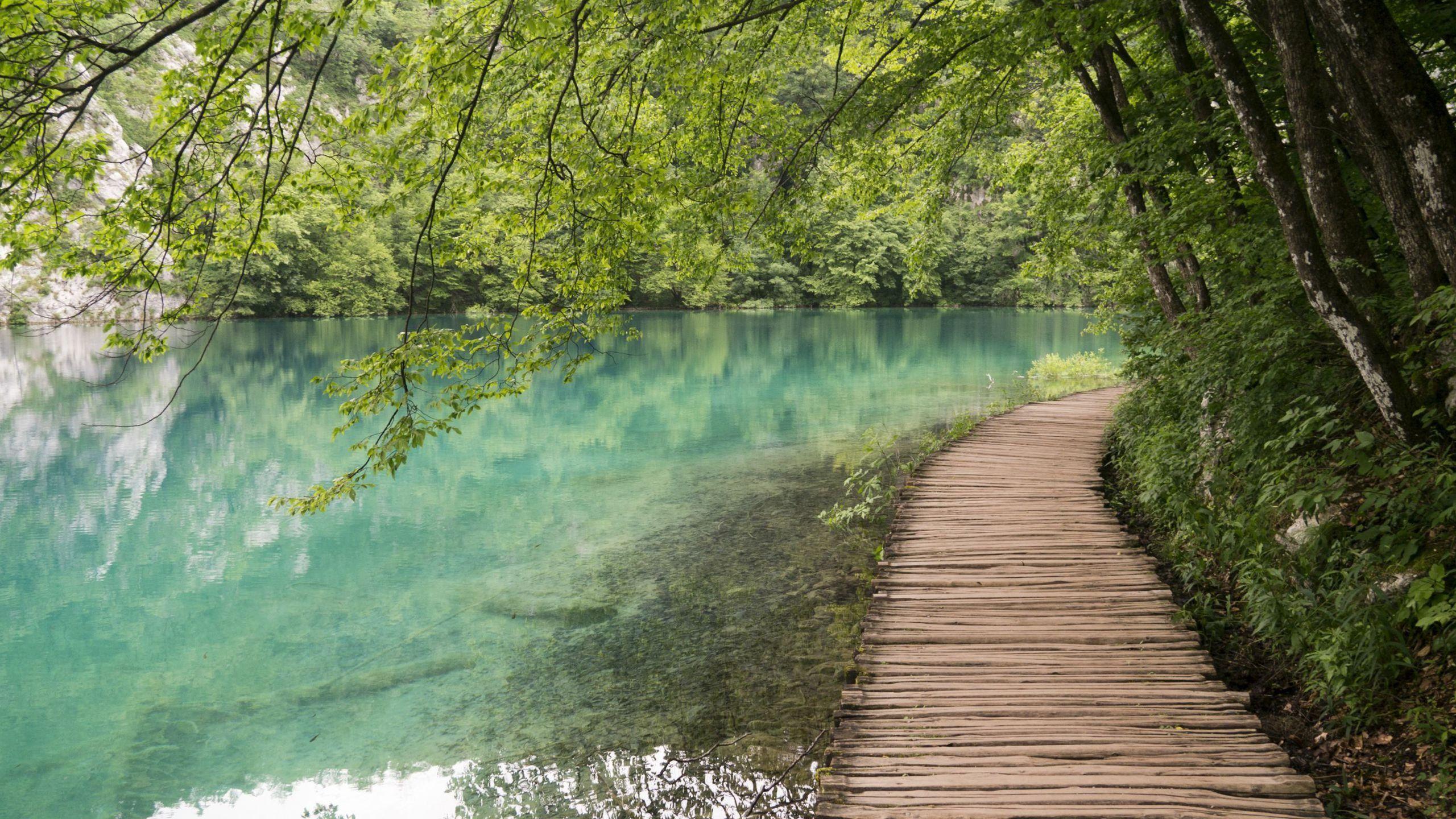 2560x1440 Wooden Path by the Lake at Plitvice Lakes National Park Croatia HD wallpaper