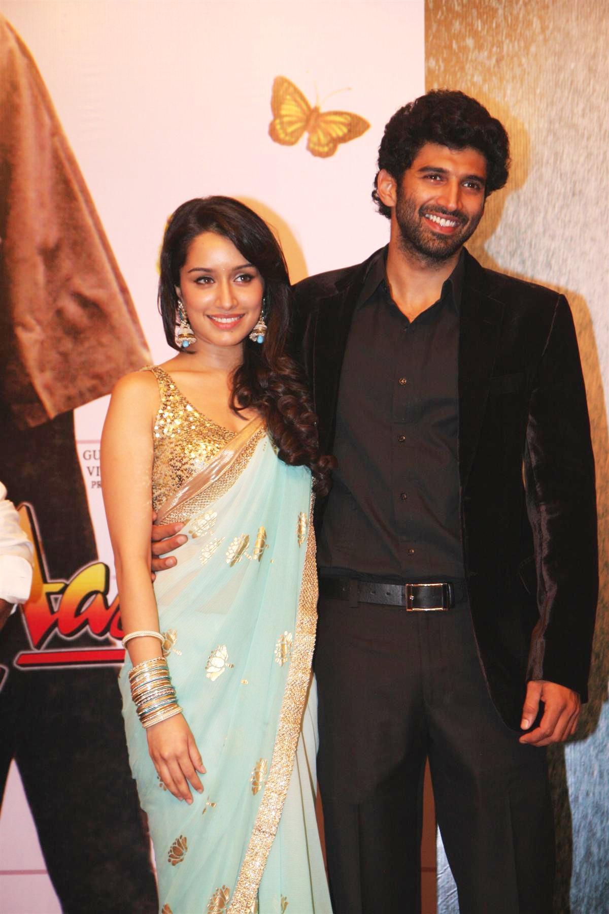 1200x1800 Aditya Roy Kapur with Shraddha Kapoor at the first look launch of film AASHIQUI 2 2 : rediff bollywood photo on Rediff Pages