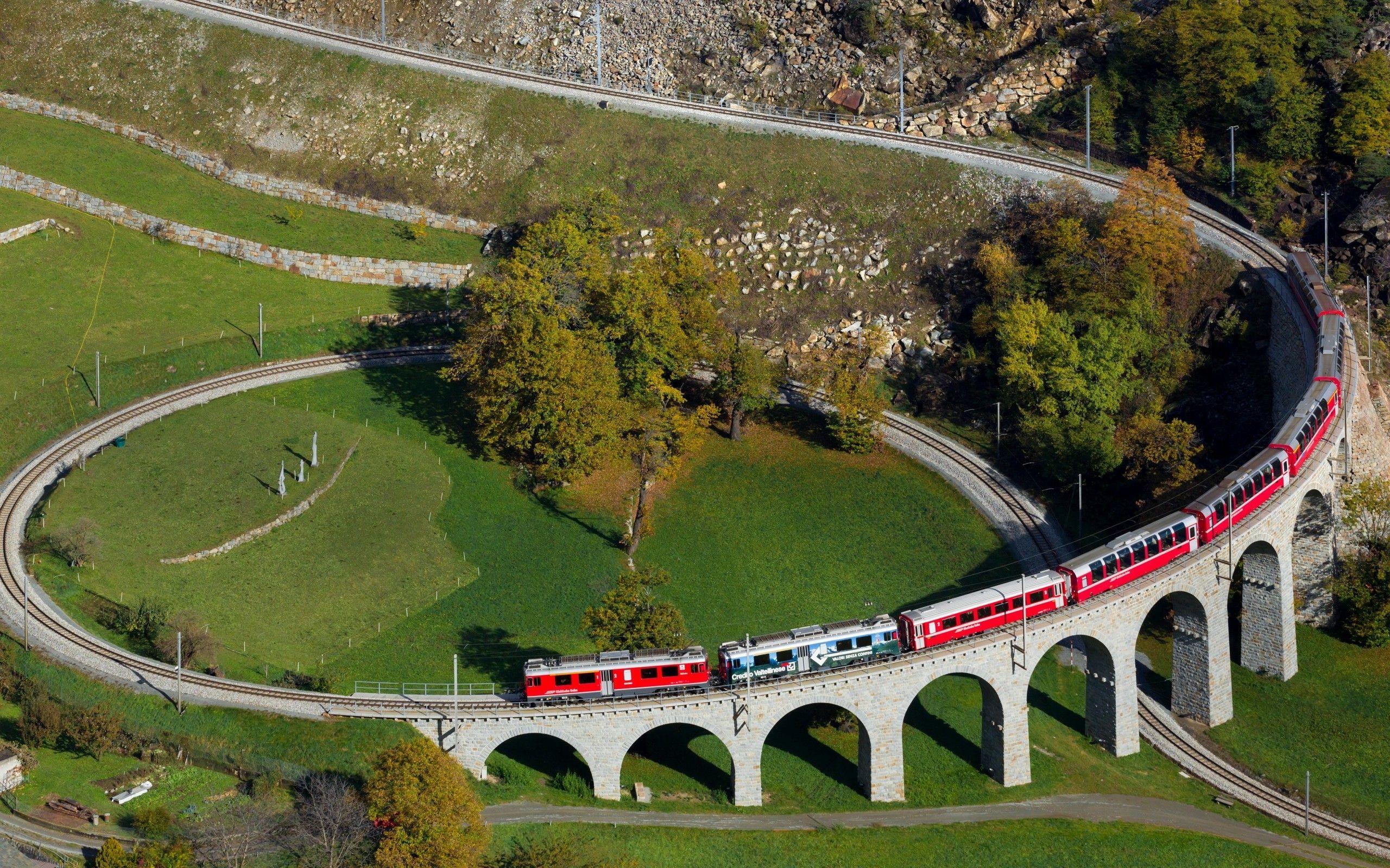 2560x1600 Download 2560x1600 Switzerland, Train, Spiral Bridge Wallpaper for MacBook Pro 13 inch