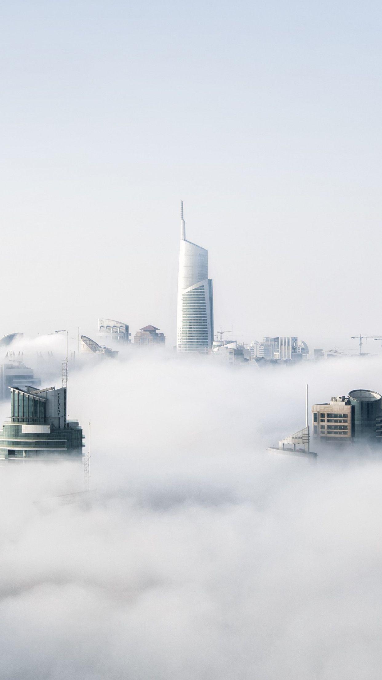 1242x2208 Download wallpaper: Fog is over Dubai 1242x2208