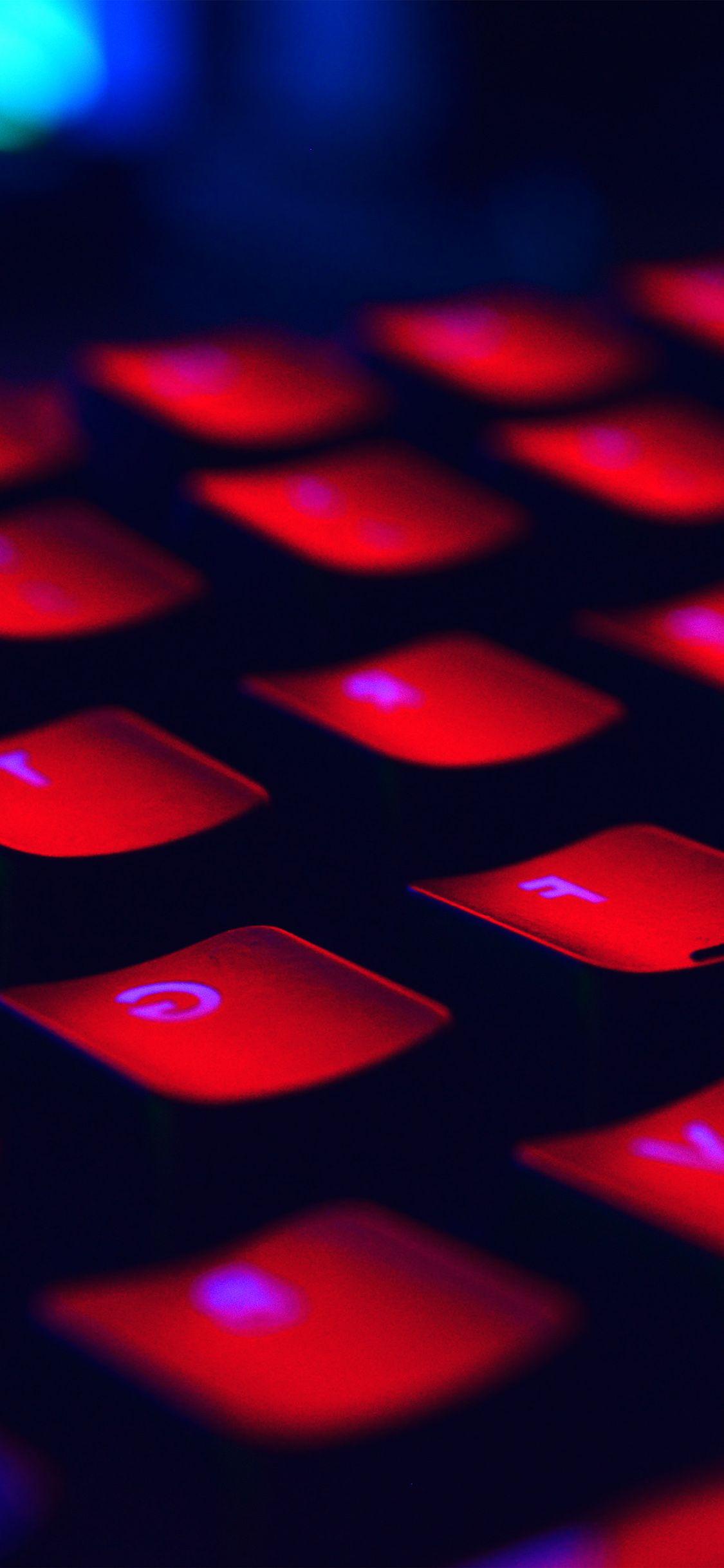 1125x2436 iPhone X wallpaper. dark red keyboard coding blue