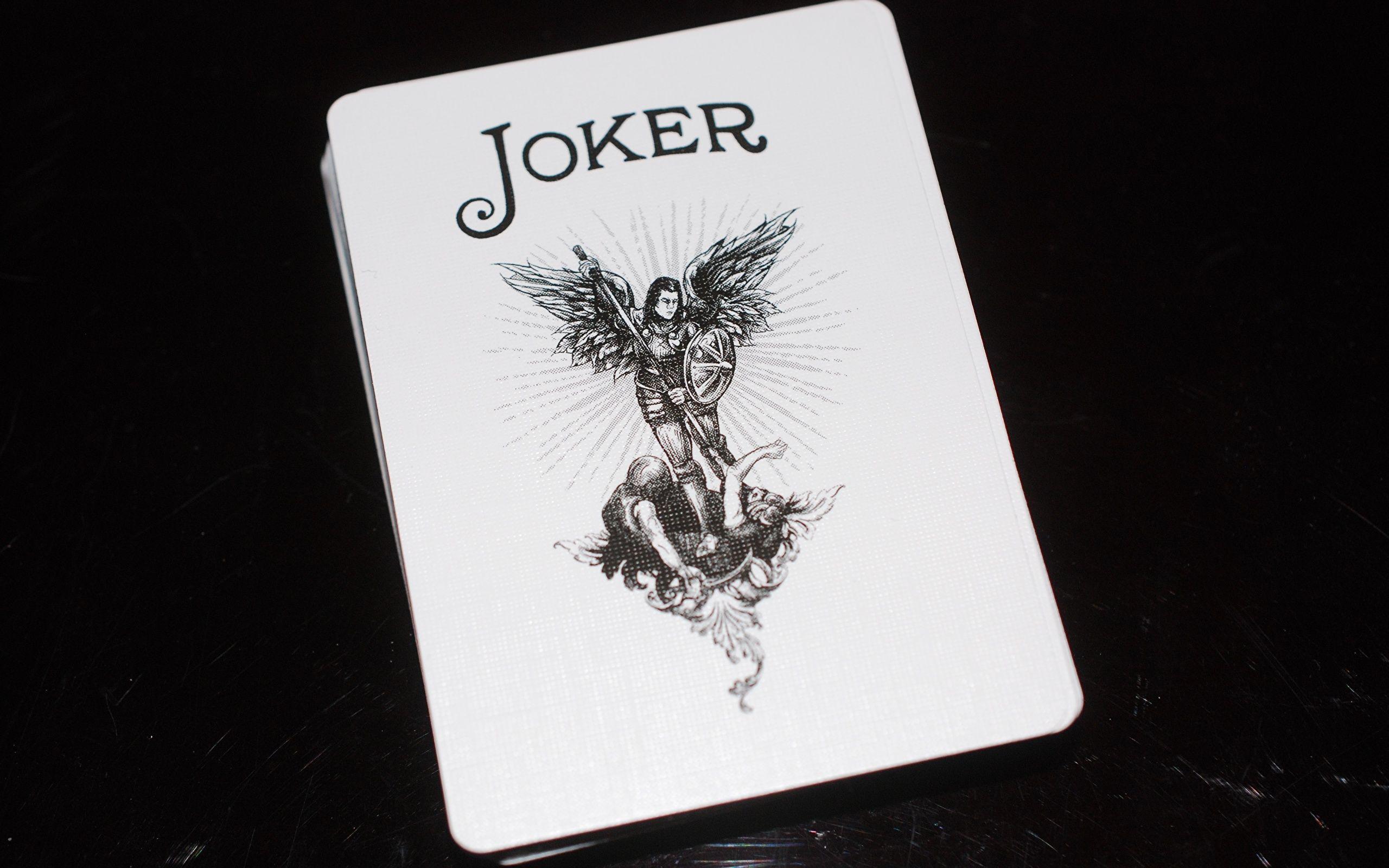 2560x1600 Picture joker Cards Closeup Black background 2560x1600