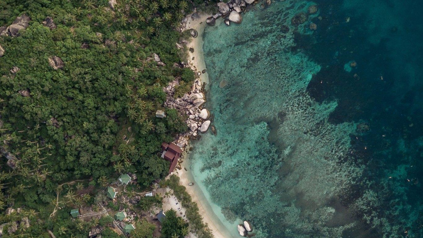 1366x768 Download 1366x768 Bird's Eye View, Ocean, Aerial View, Drone Shot, Houses, Trees Wallpaper for Laptop, Notebook