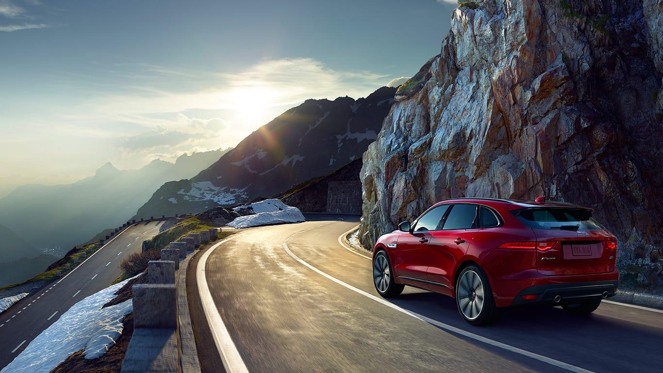1366x769 Jaguar F Pace Hills Sunset View Uhd Wallpaper