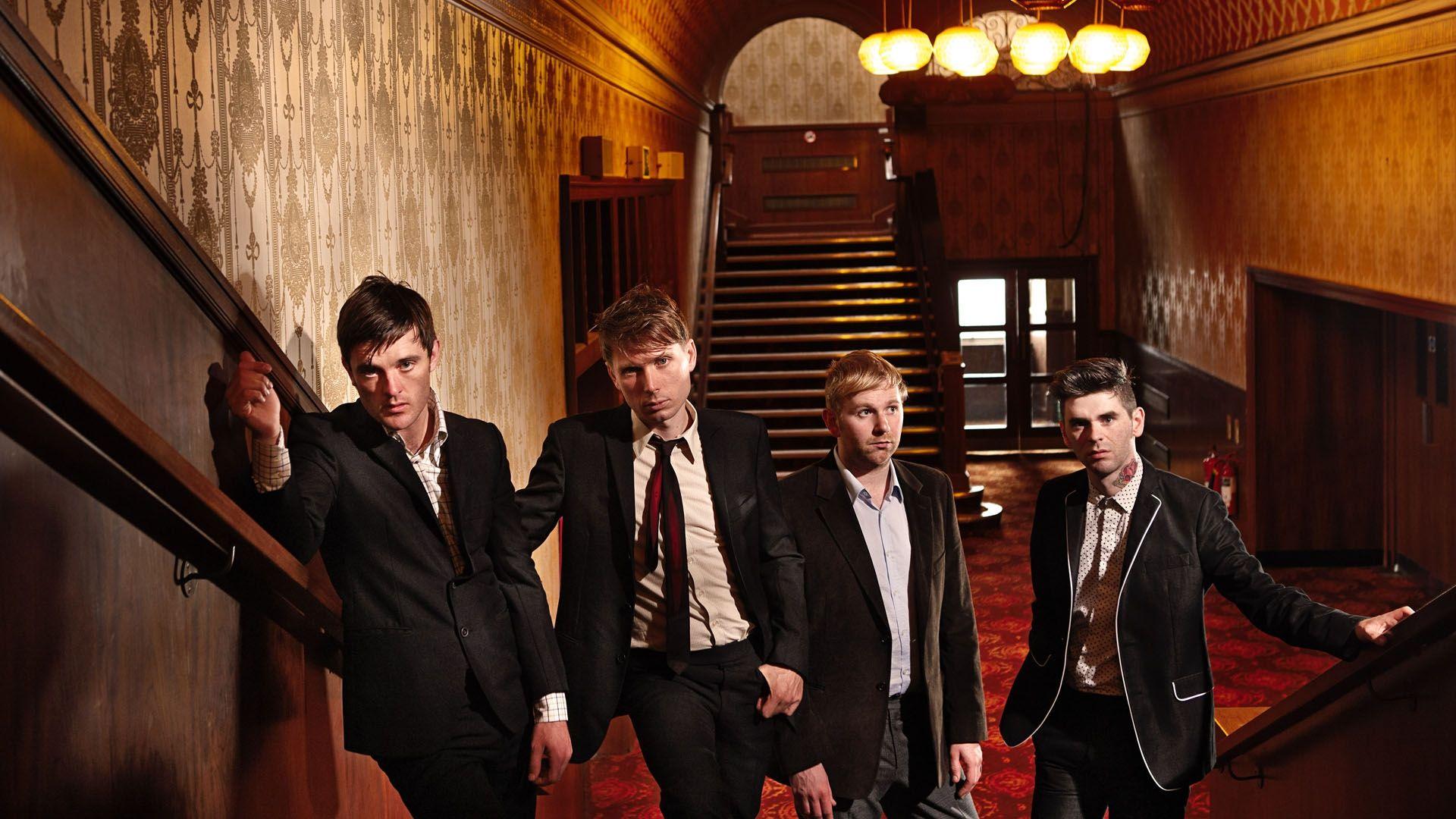 1920x1080 Download Wallpaper 1920x1080 franz ferdinand, room, stairs, hall, suits Full HD 1080p HD Background