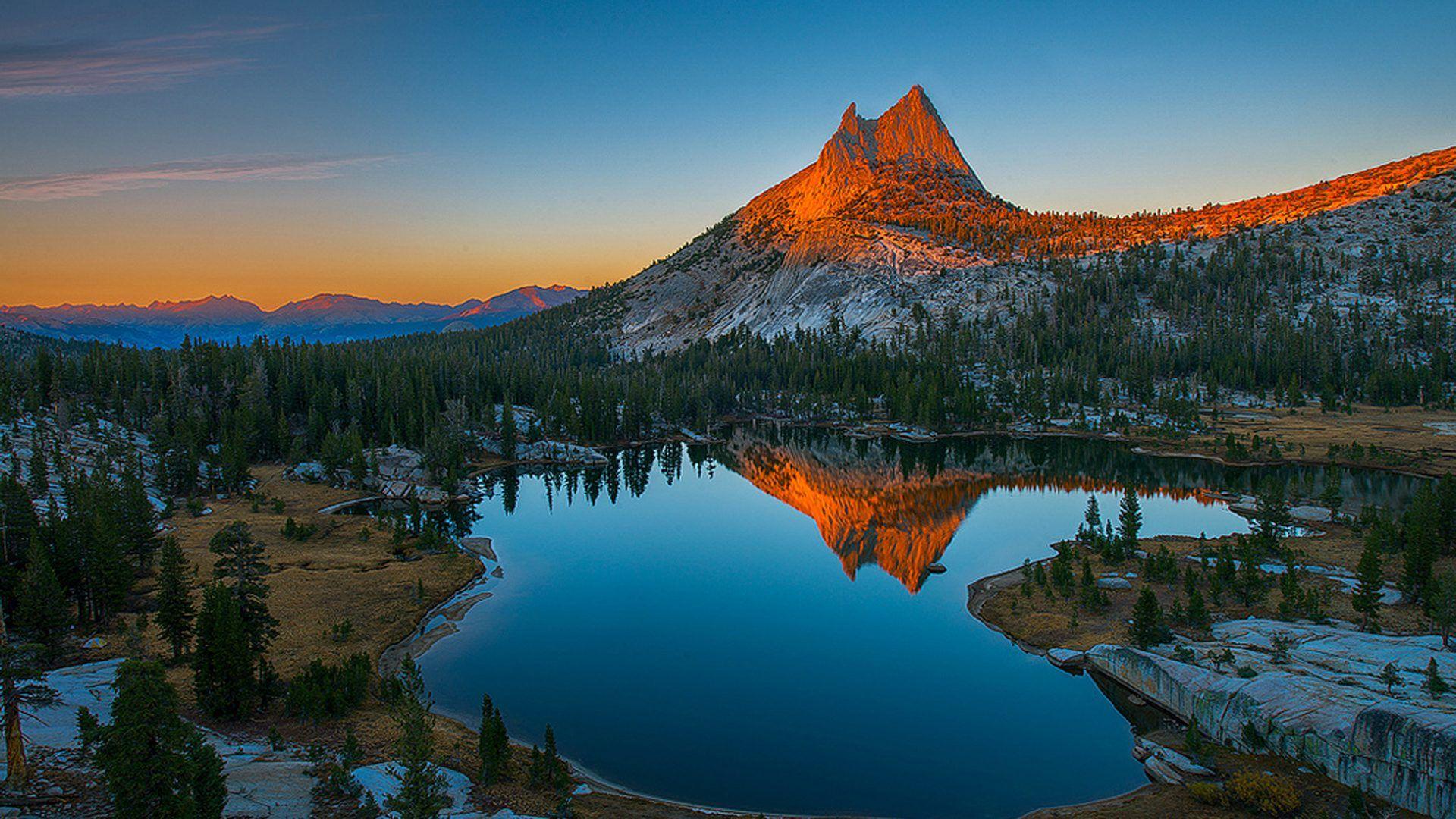 1920x1080 Sunset Mountain Rocky Mountain Top Lake Reflecting In Water HD Desktop Wallpaper :