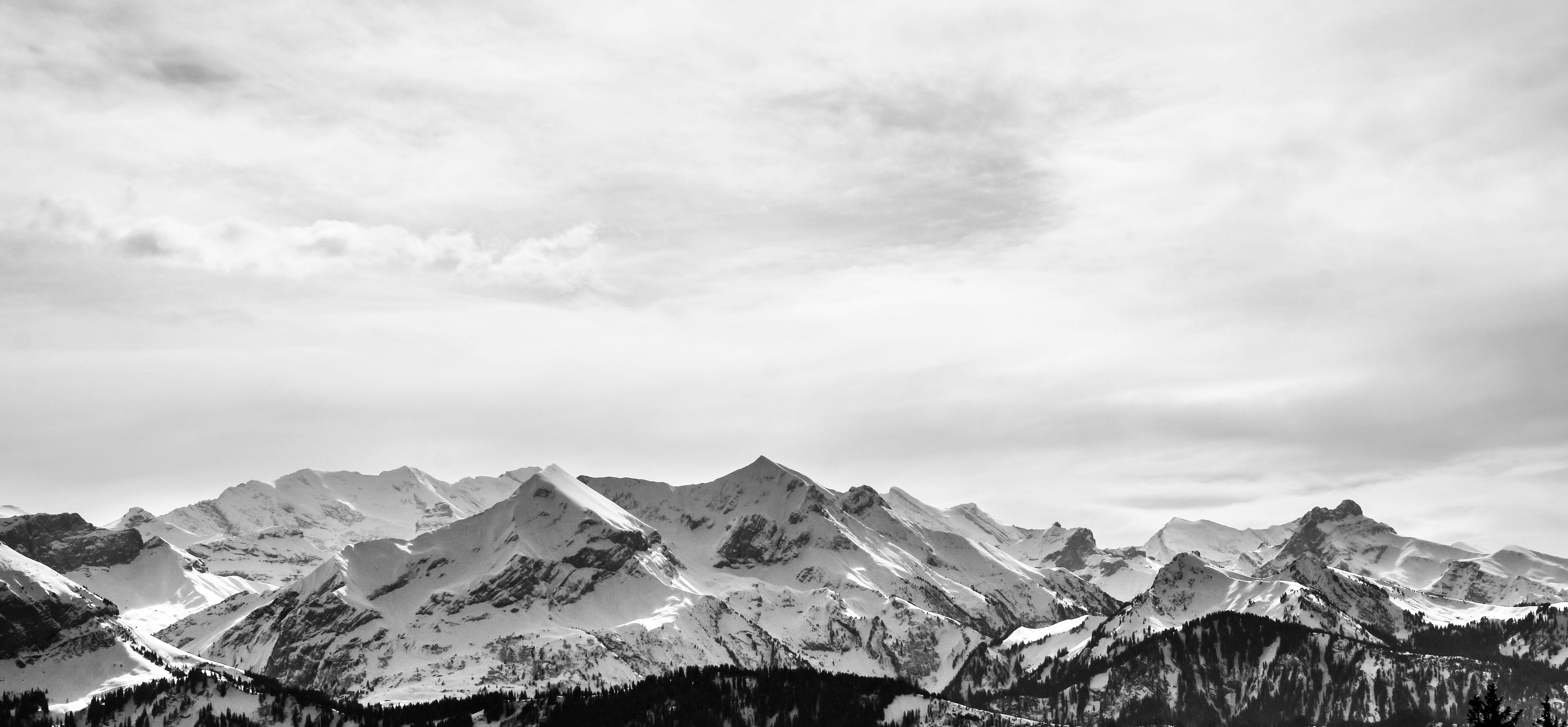 black and white mountains under blue sky iPhone 8 Wallpapers Free Download