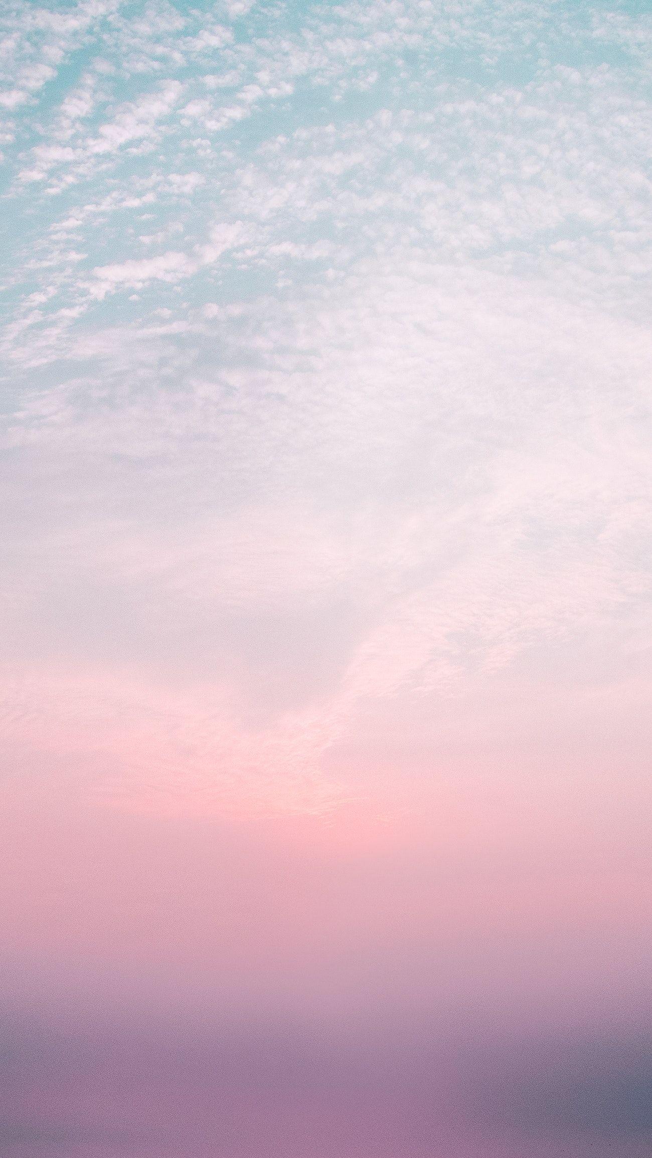 1300x2310 Pink sky mobile phone lock screen. Royalty free photo