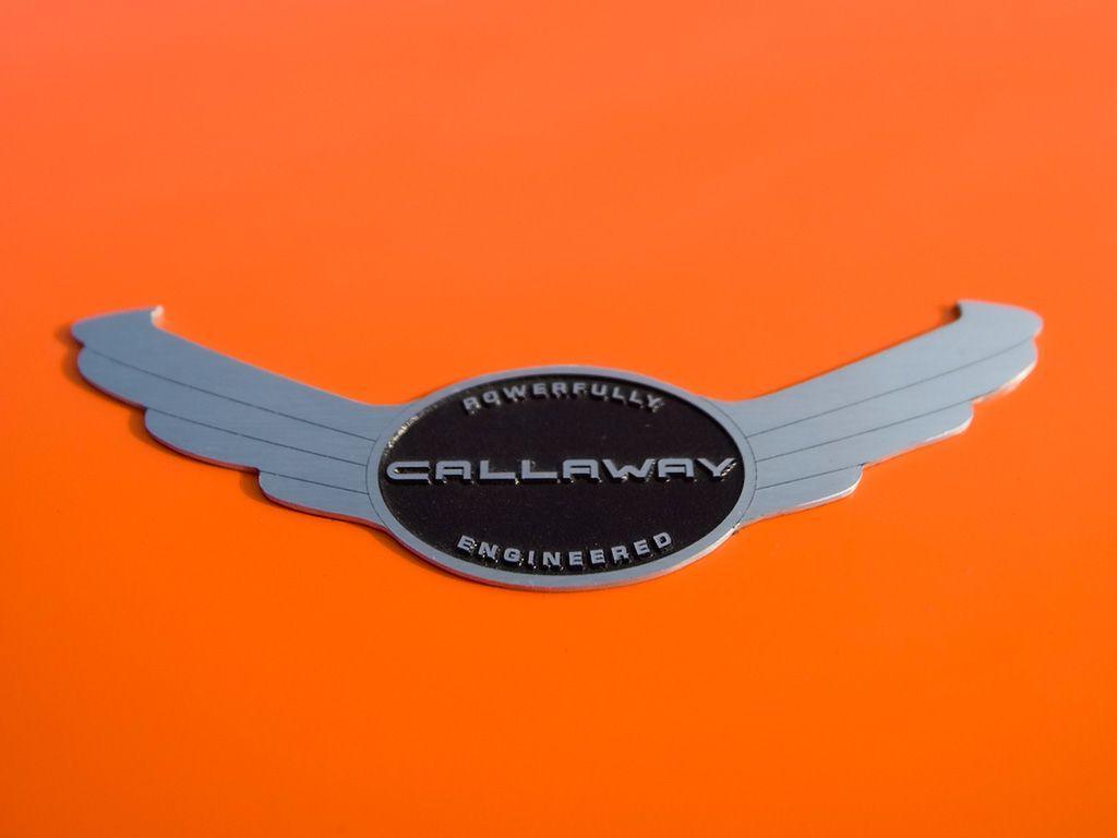1024x768 sports and home: corvette logo wallpaper
