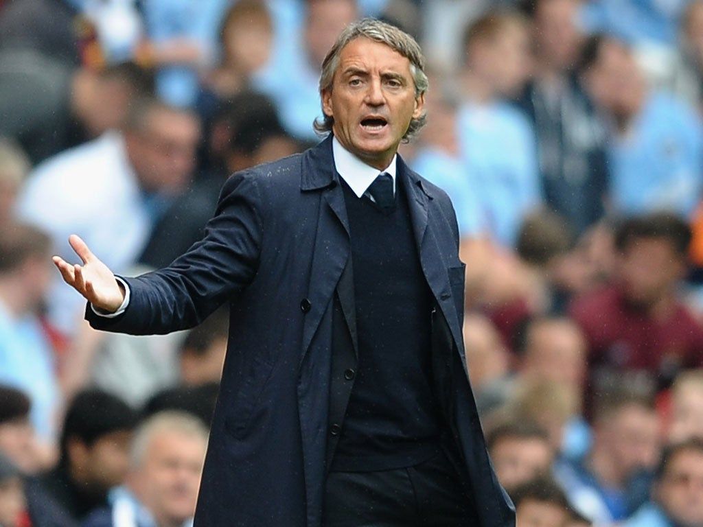 1024x768 Manchester City boss Roberto Mancini calm ahead of Real Madrid clash