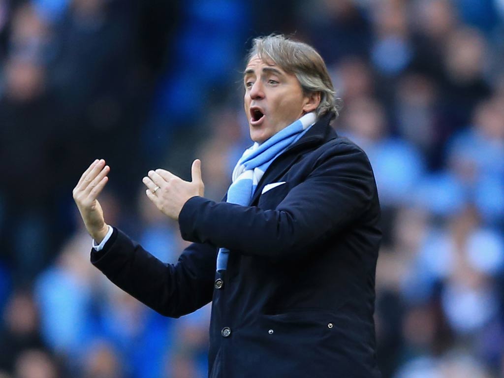1024x768 Manchester City have changed the face of English football claims Roberto Mancini