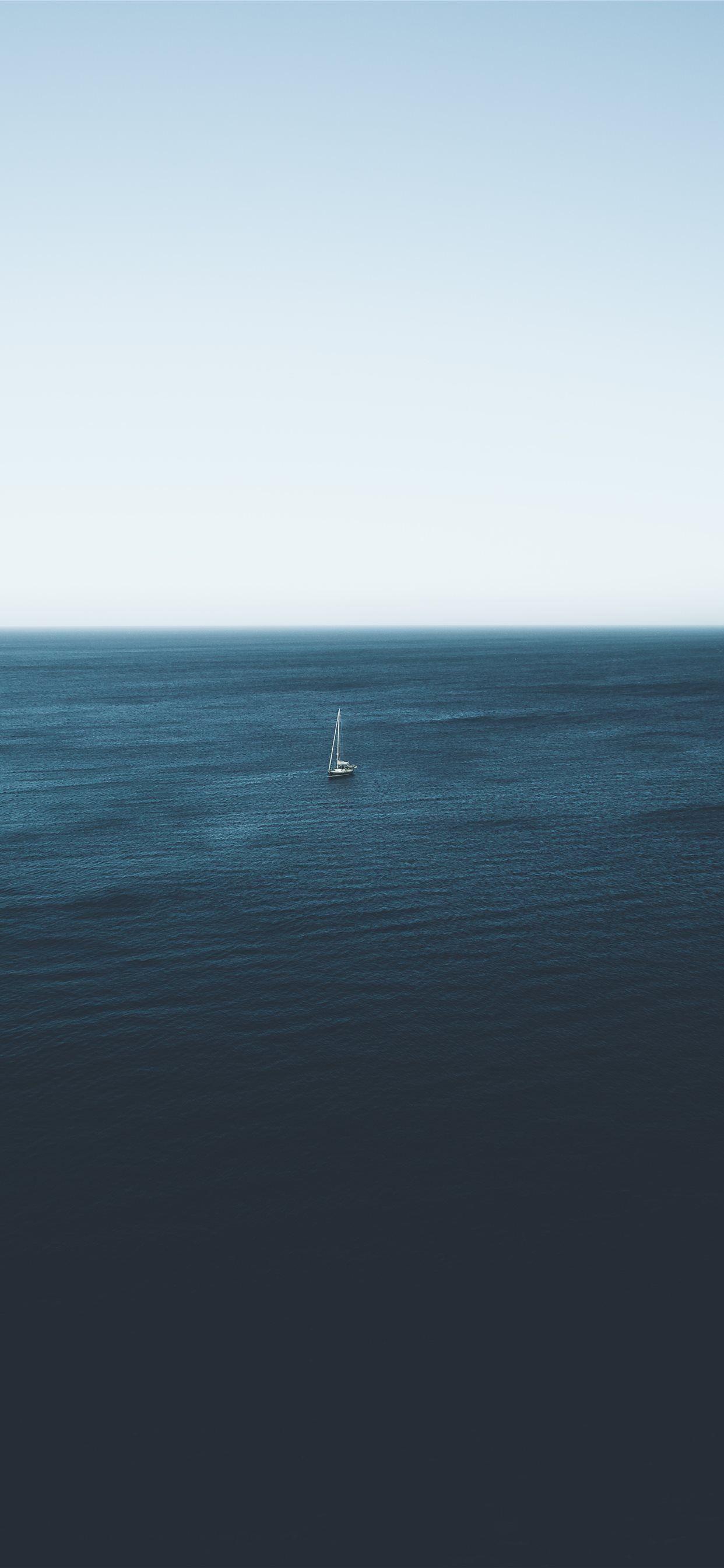 1242x2688 sailboat on body of water during daytime iPhone Wallpaper Free Download