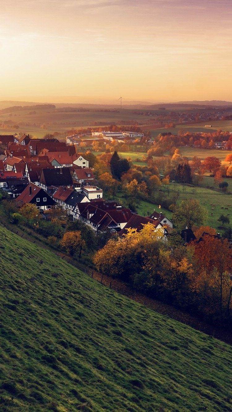 750x1334 Morning Autumn Light Small Village Hills iPhone 6 Wallpaper HD