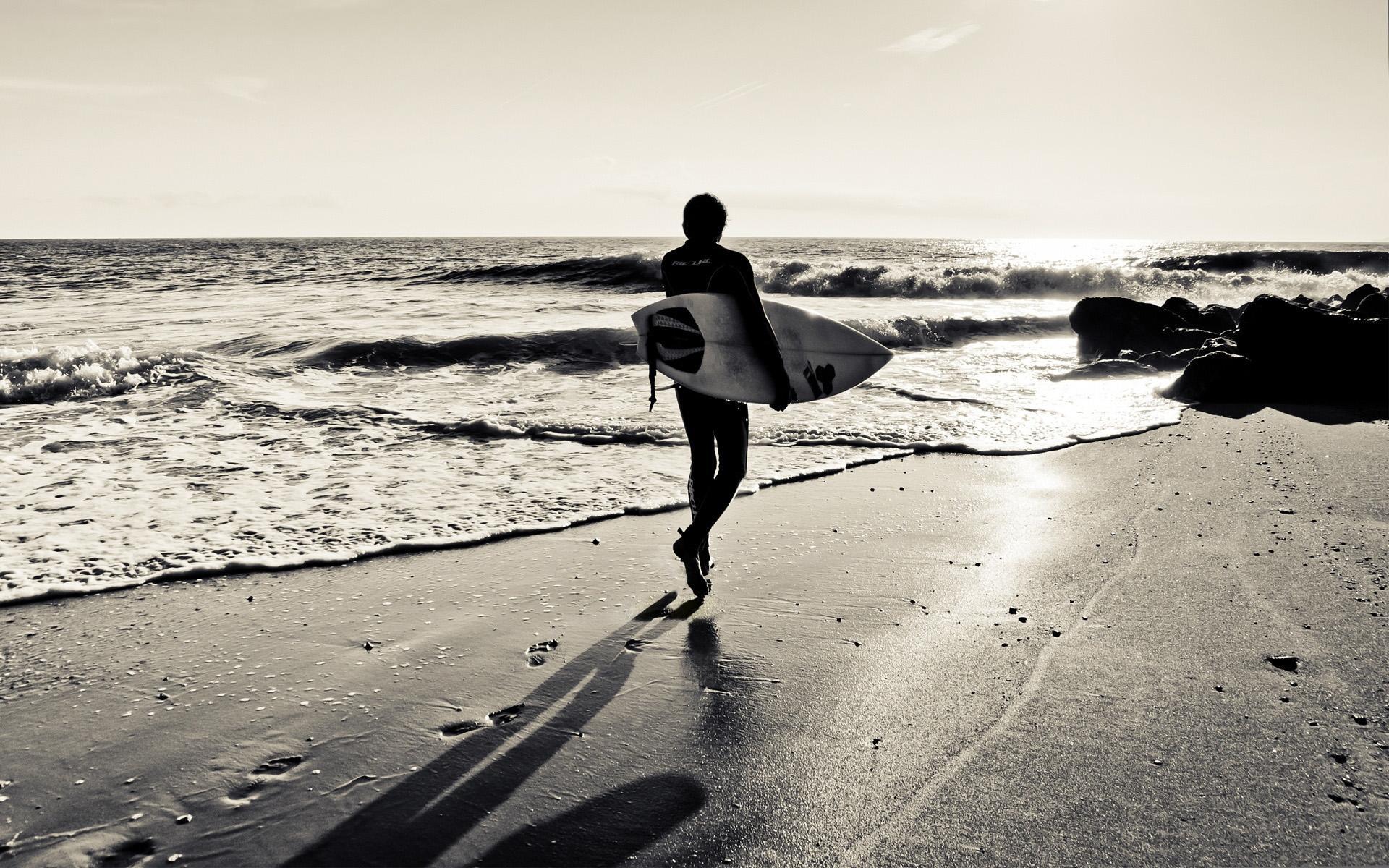 1920x1200 Surfing surfboard beaches ocean sea waves black white sky sunset sunrise wallpaperx1200