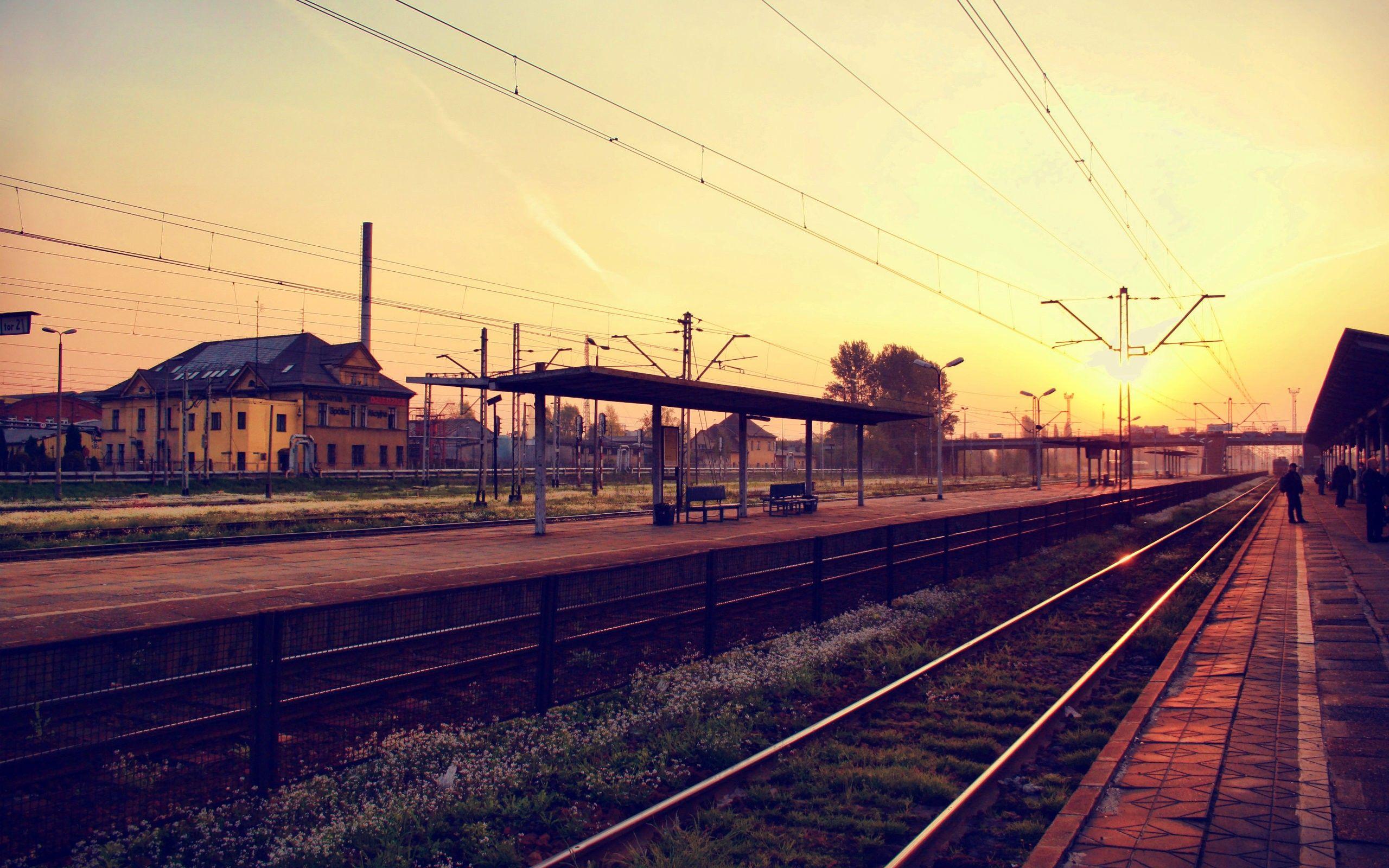 2560x1600 Sun, station, town, terminal, Poland, sunlight, railroad tracks, railroads, wires, railway, railway station, townscape wallpaper