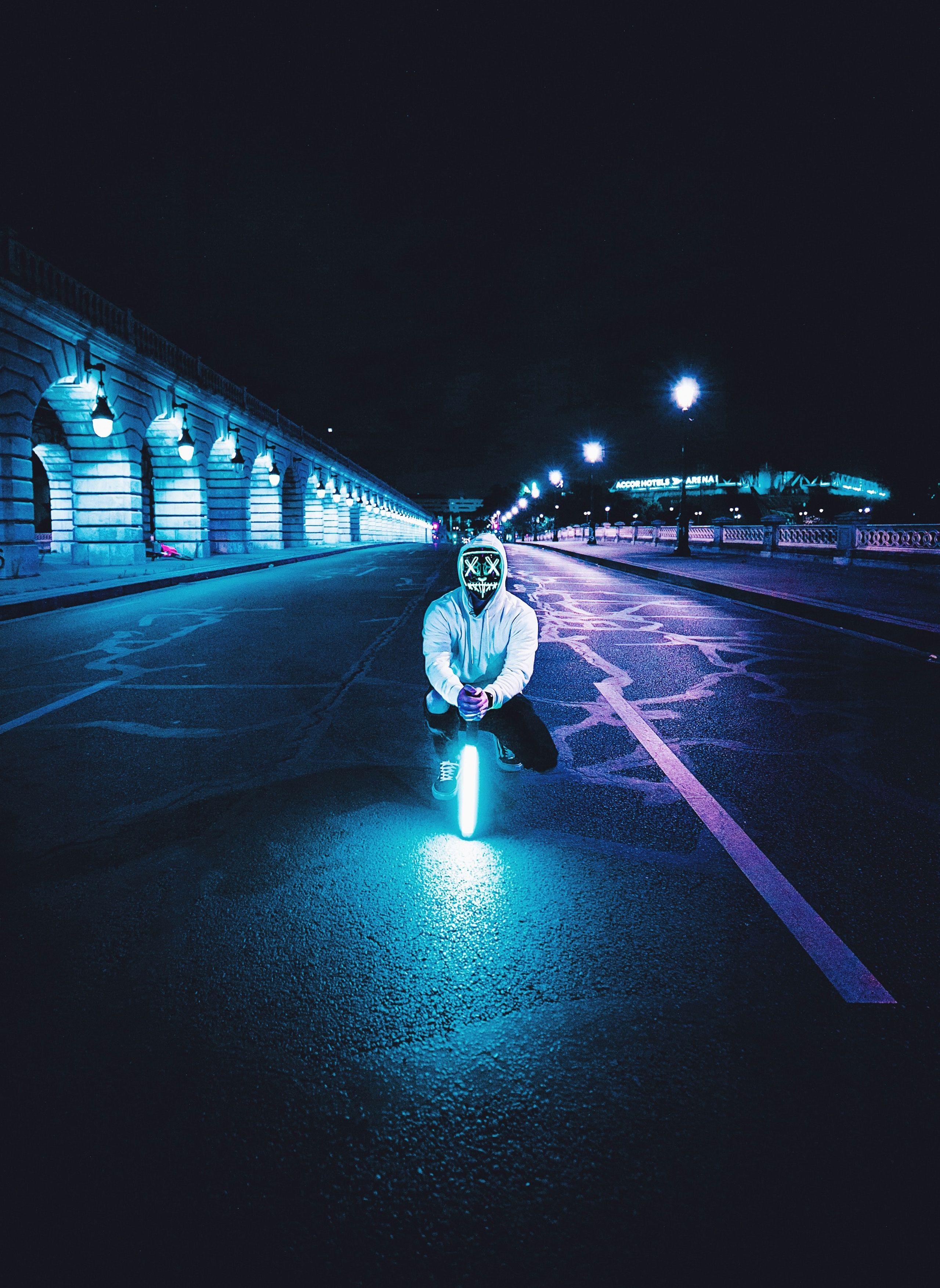 2560x3508 Man 4K Wallpaper, LED mask, Lightsaber, Road, Tarmac, City lights, Night, Neon, Photography