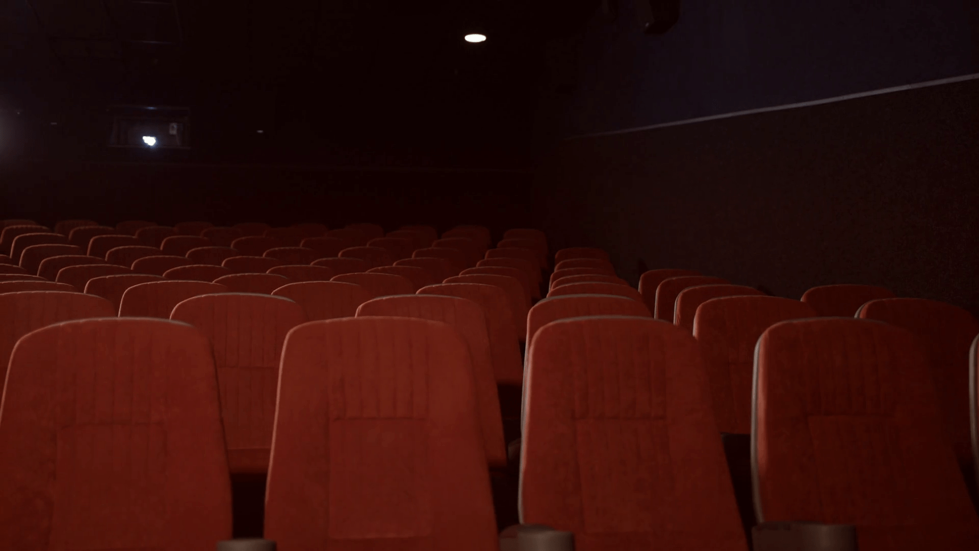 1920x1080 Empty seats in cinema theatre. Red seats in movie theatre. Empty theatre hall with red armchairs. Cinema hall with chairs is ready for visitors Stock Video Footage