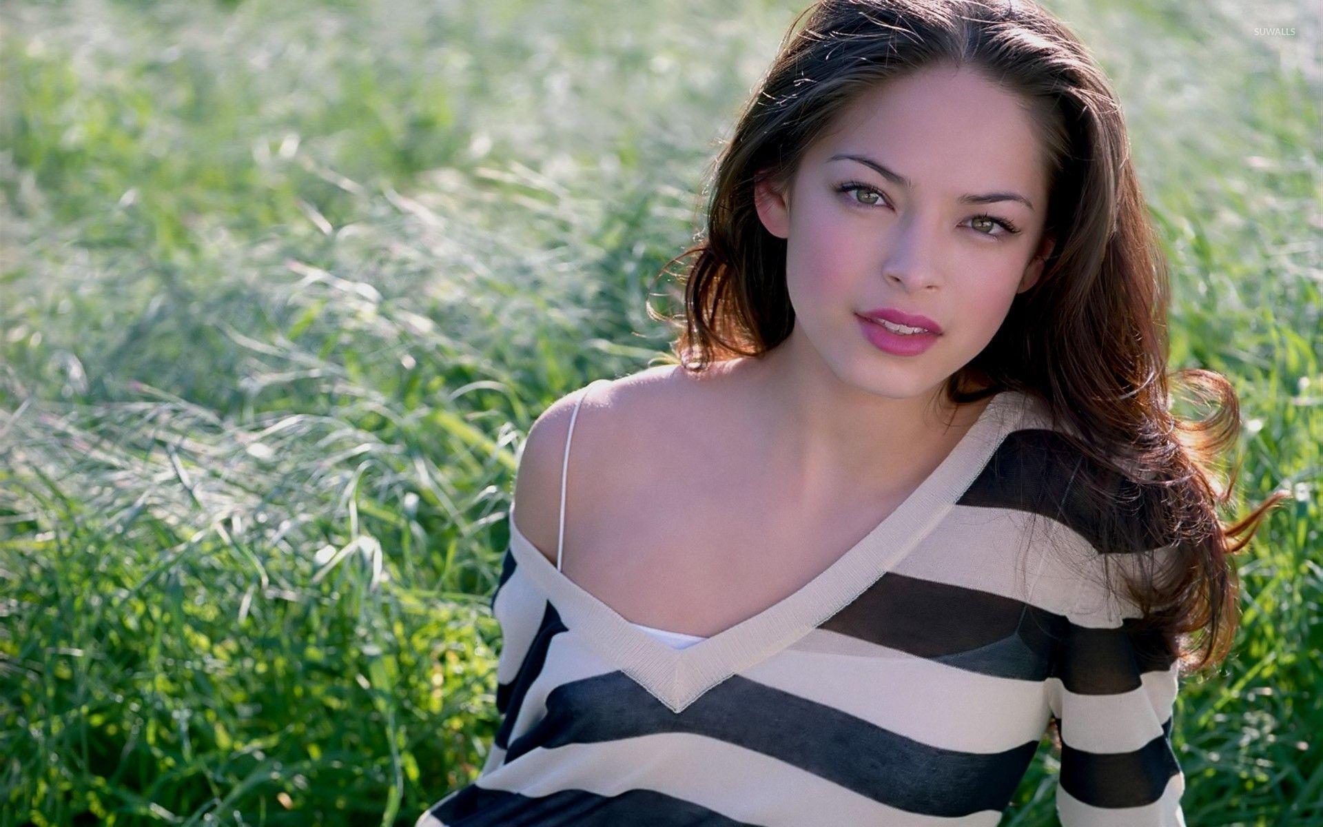 1920x1200 Kristin Kreuk sitting in the grass wallpaper wallpaper