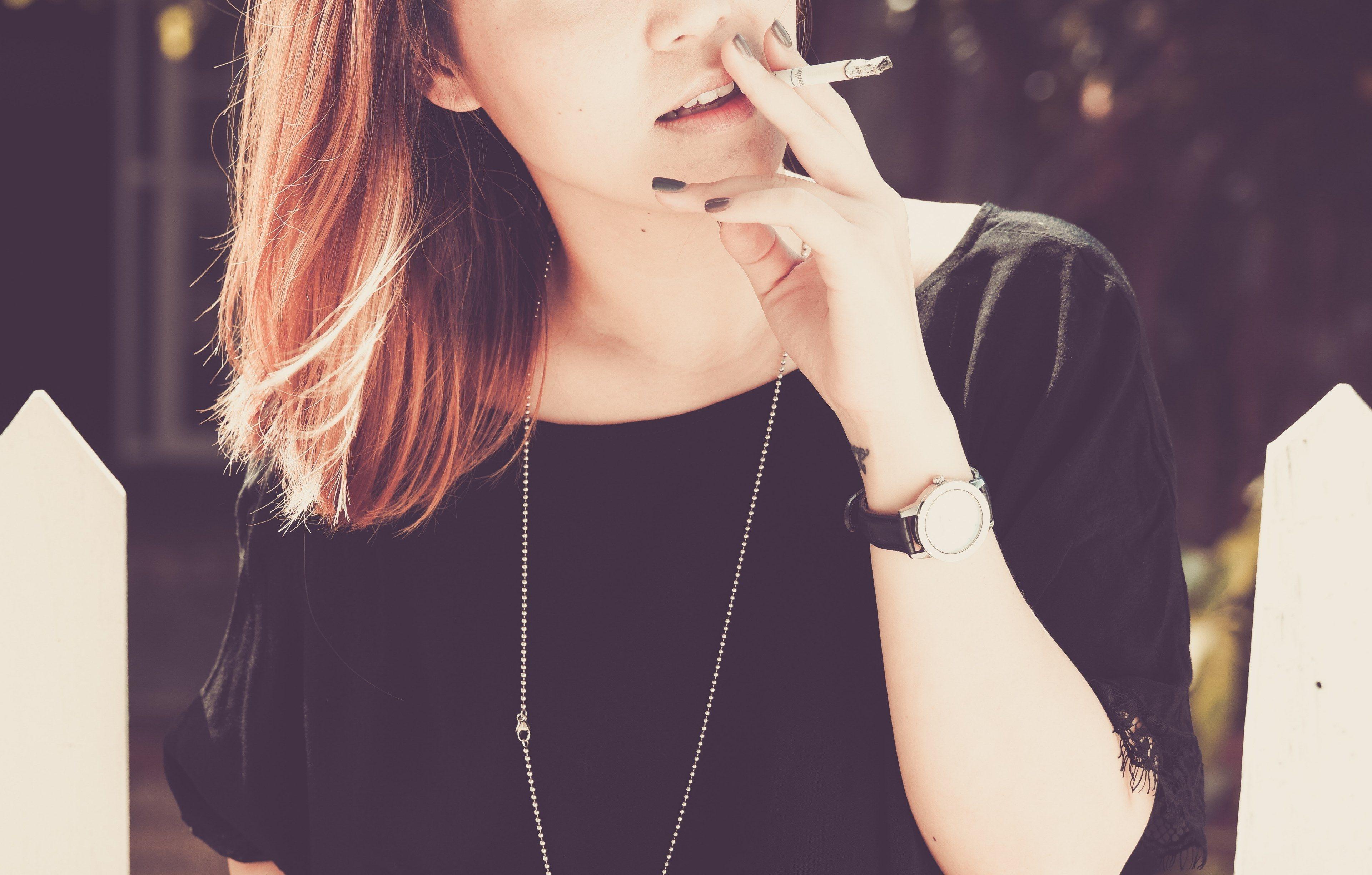 3840x2448 Wallpaper / young woman smoking a cigarette outside, bad habits 4k wallpaper