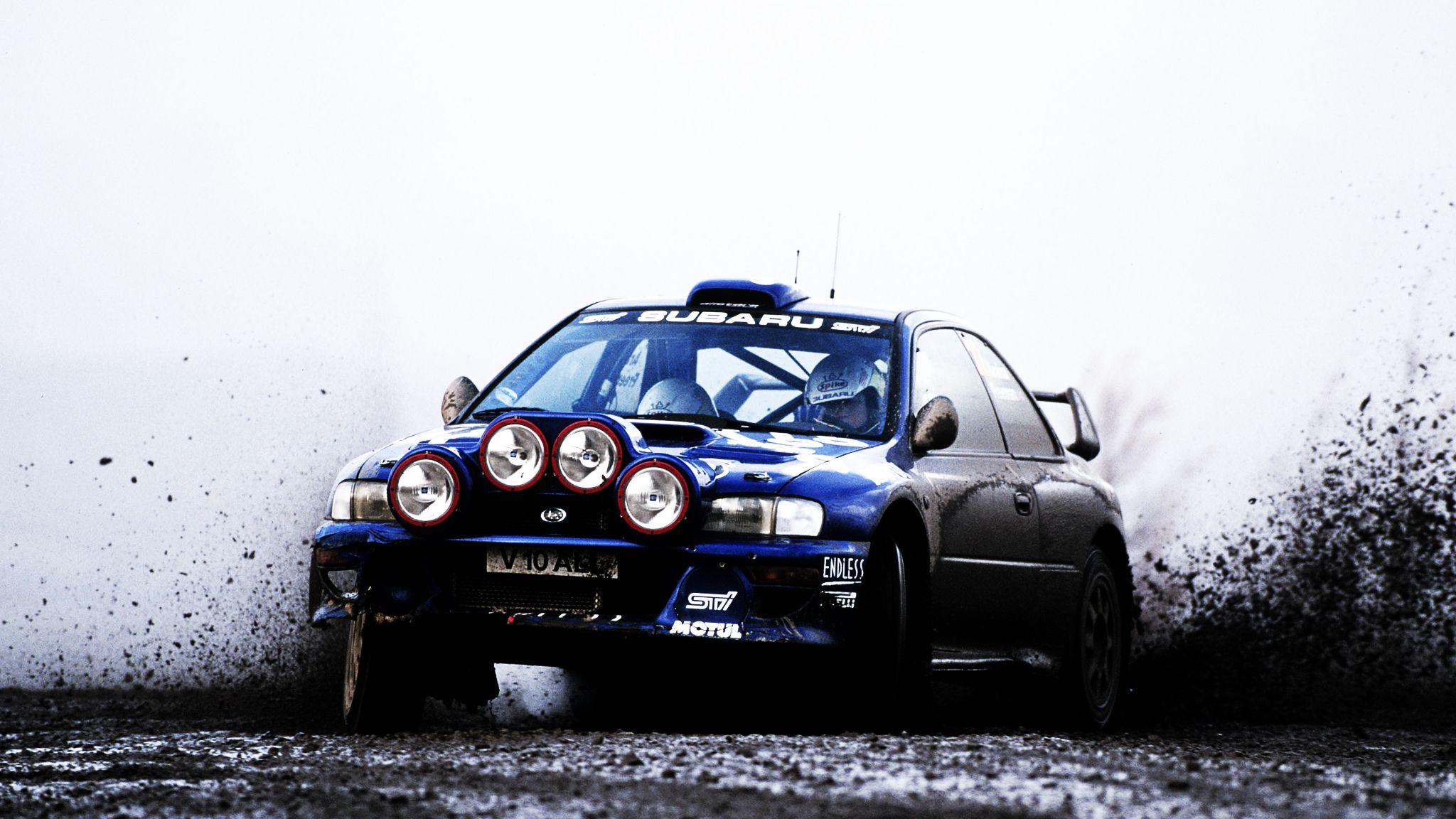 2048x1152 Subaru Rally Car Wallpaper