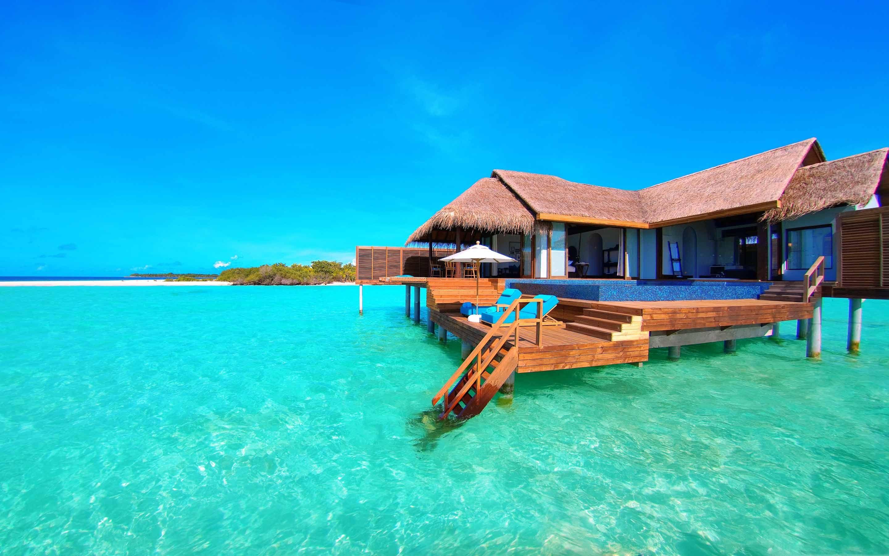 2880x1800 Water Bungalows On A Tropical Island MacBook Air Wallpaper Download