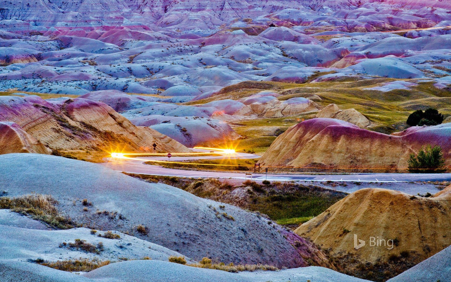 1920x1200 Headlights streaking through Badlands National Park, South Dakota