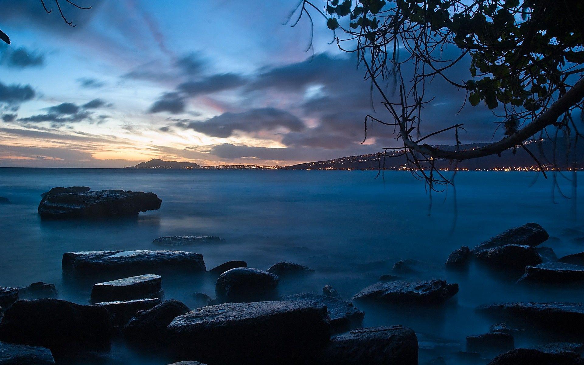 1920x1200 Night, sea, stones, seaside, city, light