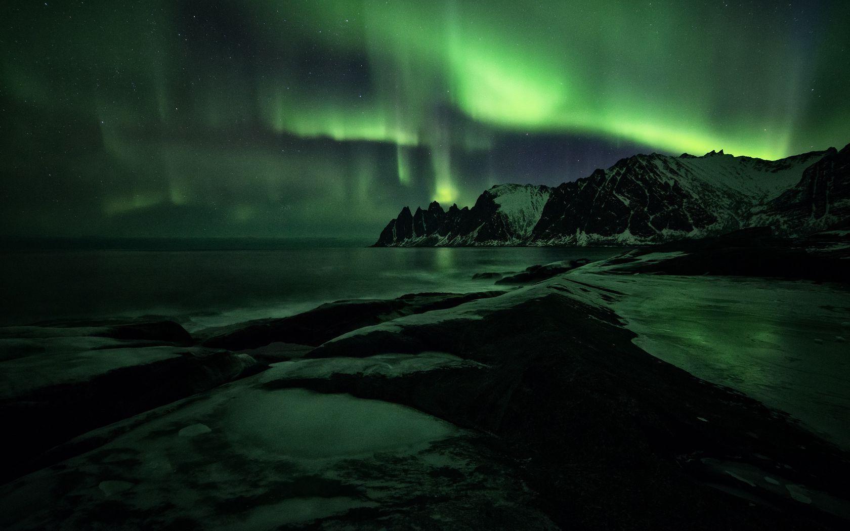 1680x1050 Download wallpaper 1680x1050 northern lights, mountains, shore, snow widescreen 16:10 HD background