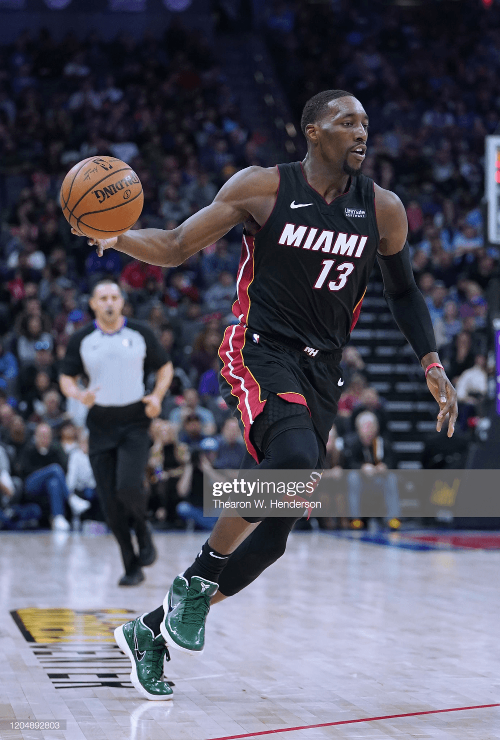 1000x1481 Bam Adebayo of the Miami Heat dribbles the ball up court against the. Miami heat, Heat, Miami