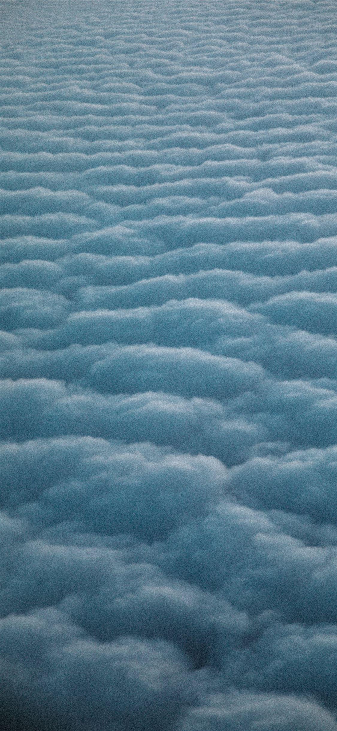 1125x2436 white clouds during day time iPhone 11 Wallpaper Free Download