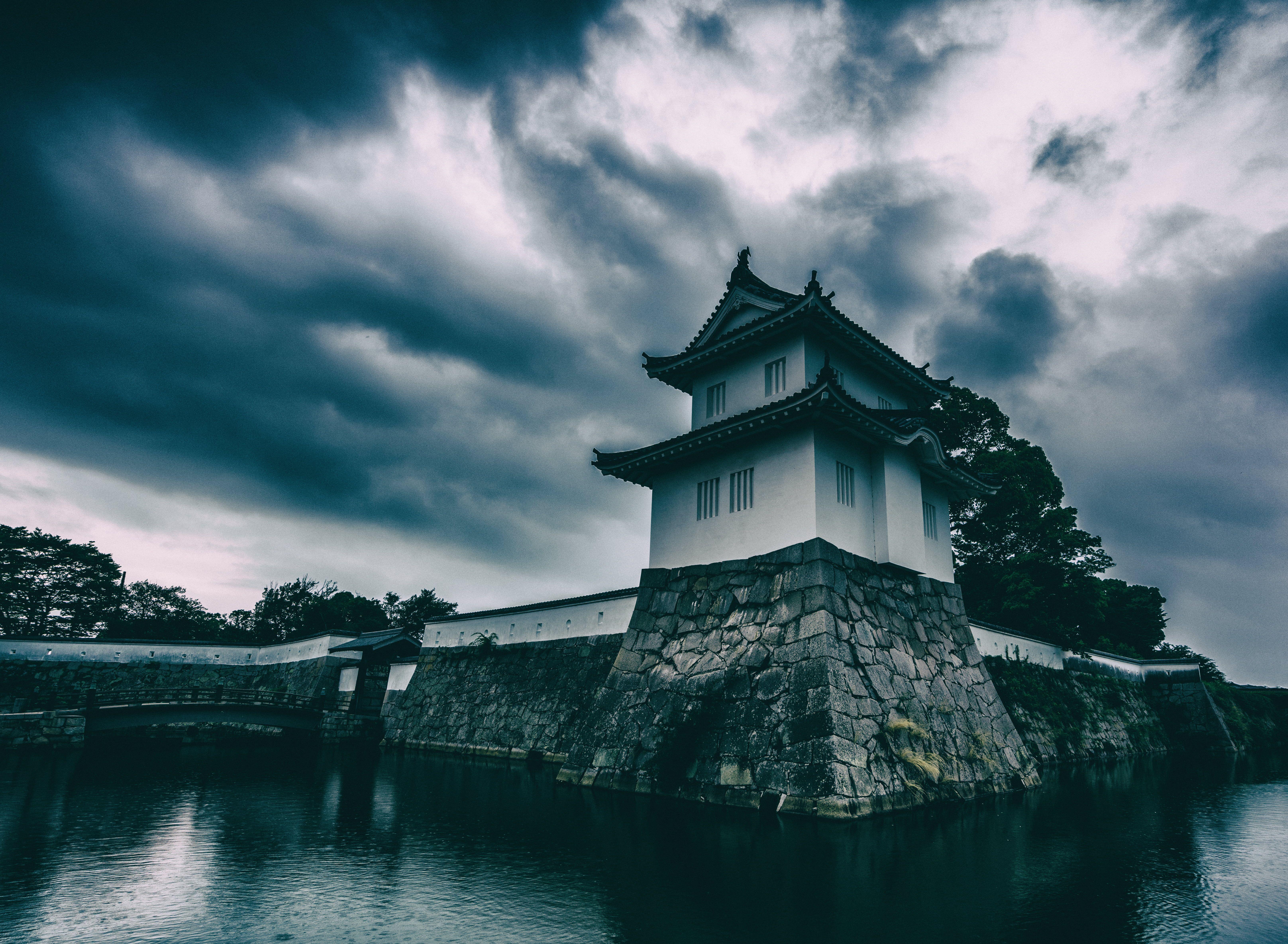 6465x4742 Architectural photography of white pagoda under cumulus nimbus