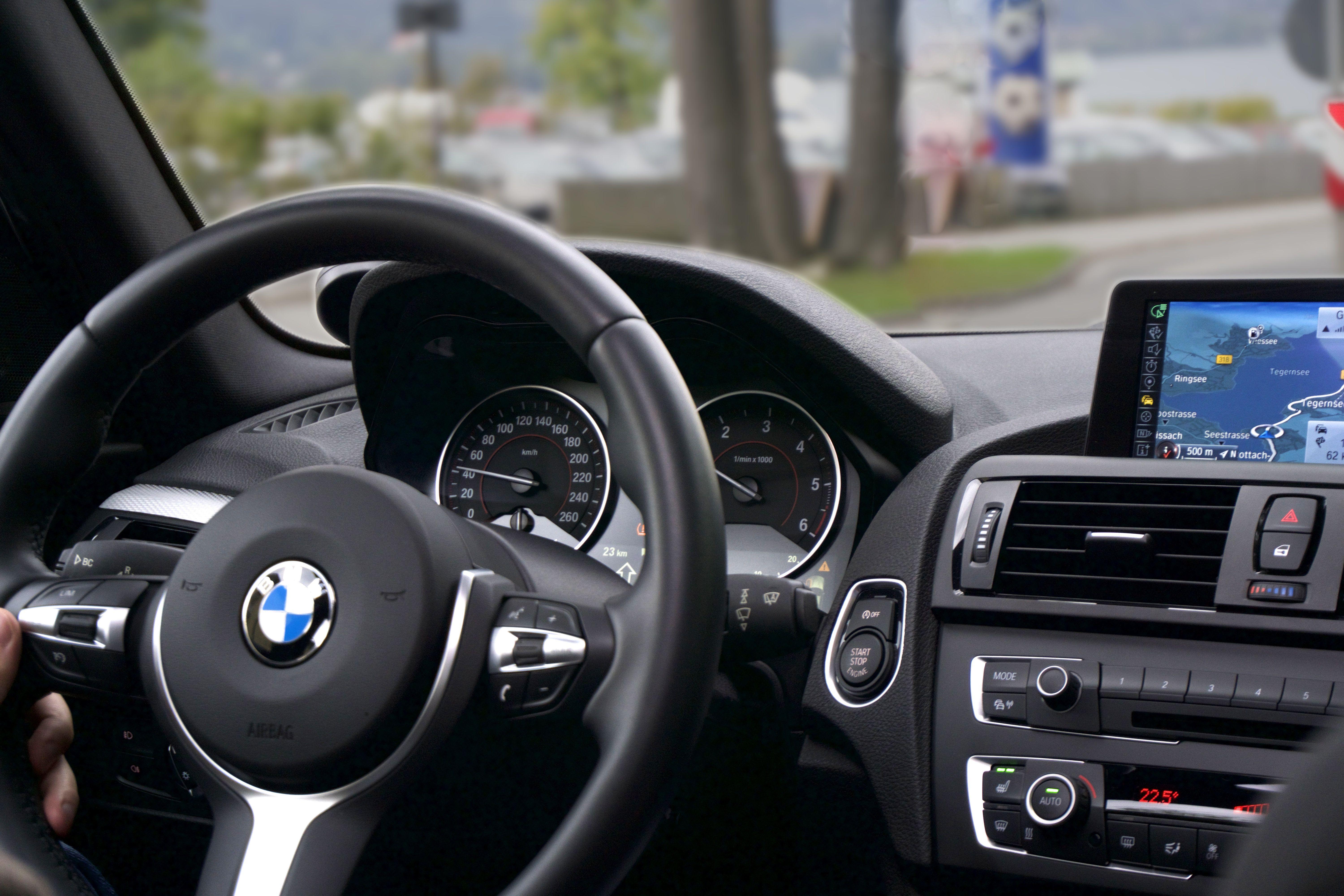 6000x4000 Person Driving Bmw Car · Free