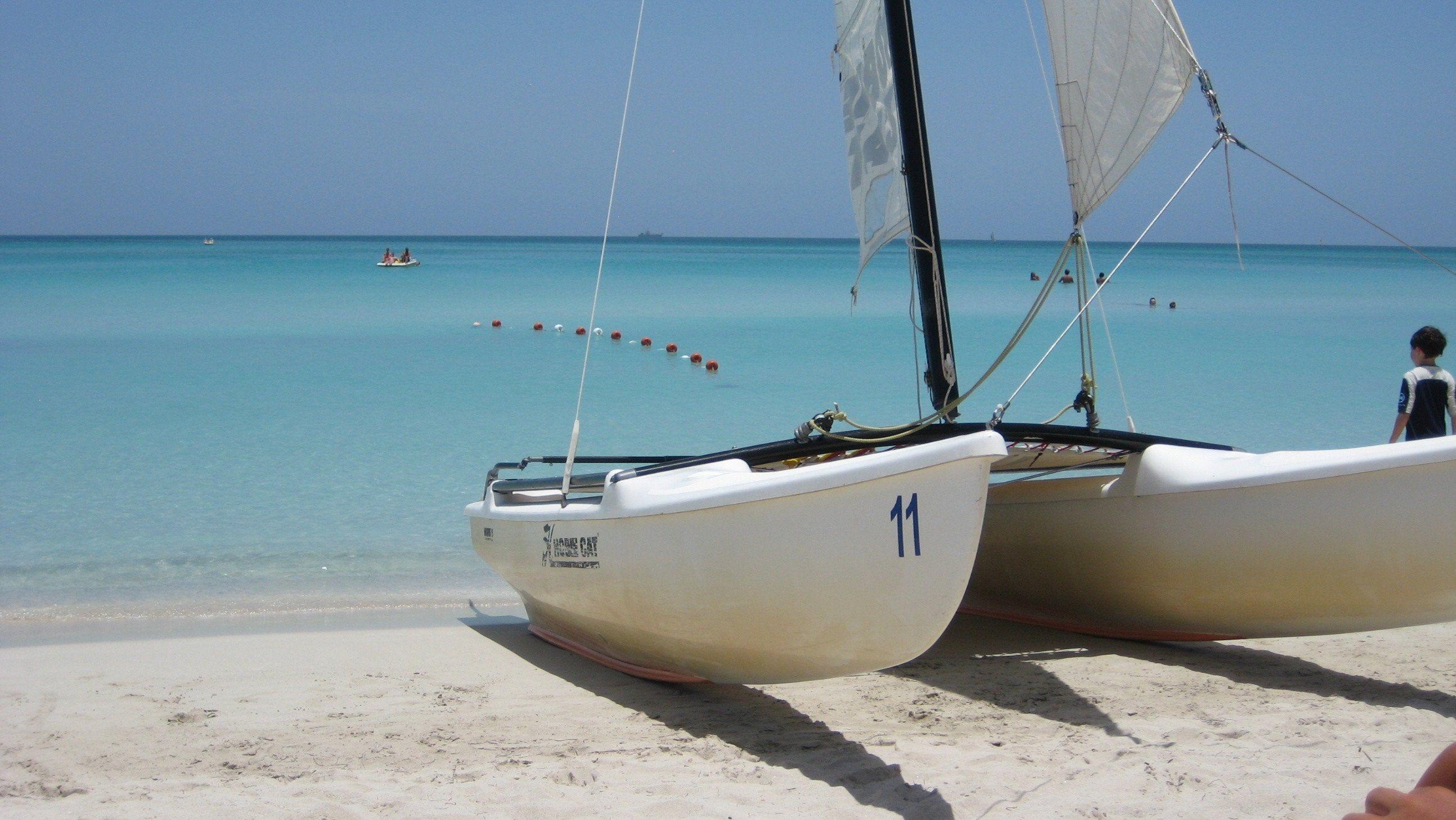 2591x1460 Catamaran on the Beach