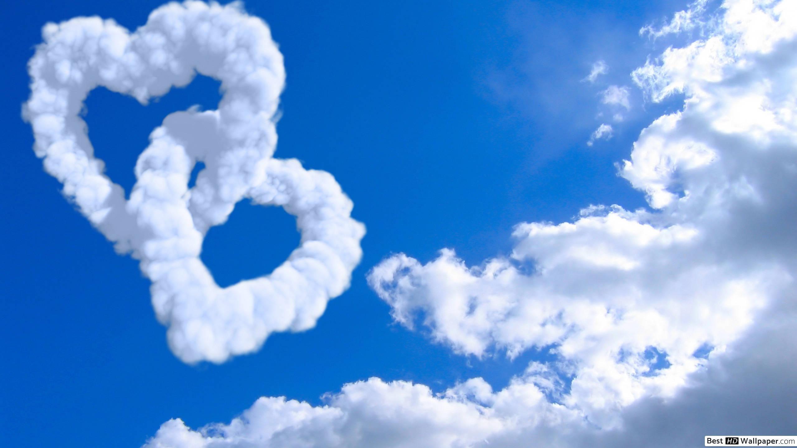 2560x1440 Valentine's day clouds in the blue sky HD wallpaper download