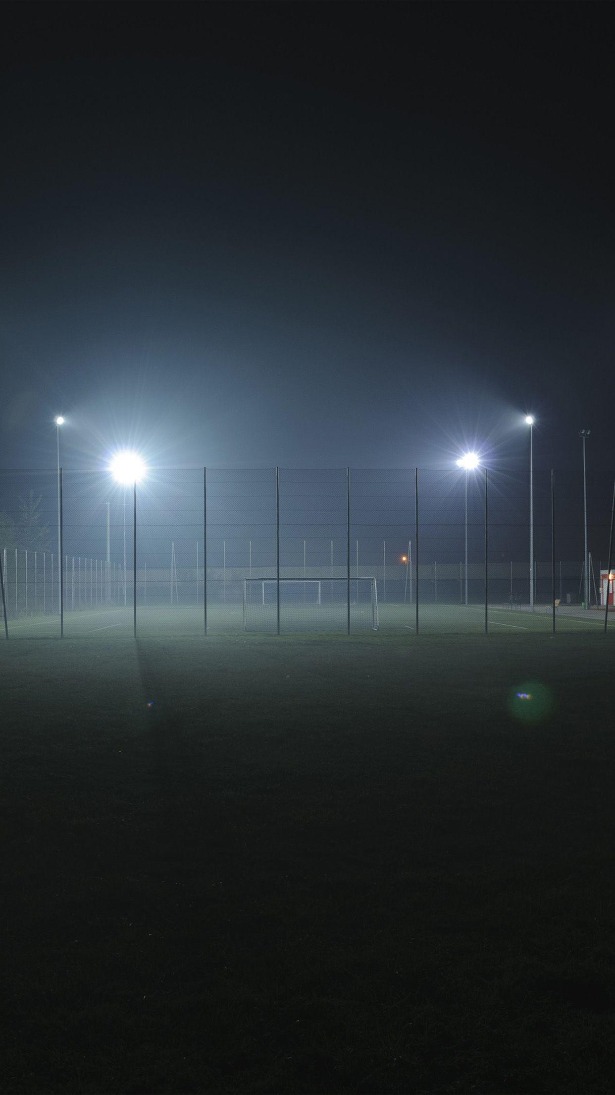 1242x2208 soccer field city night light dark