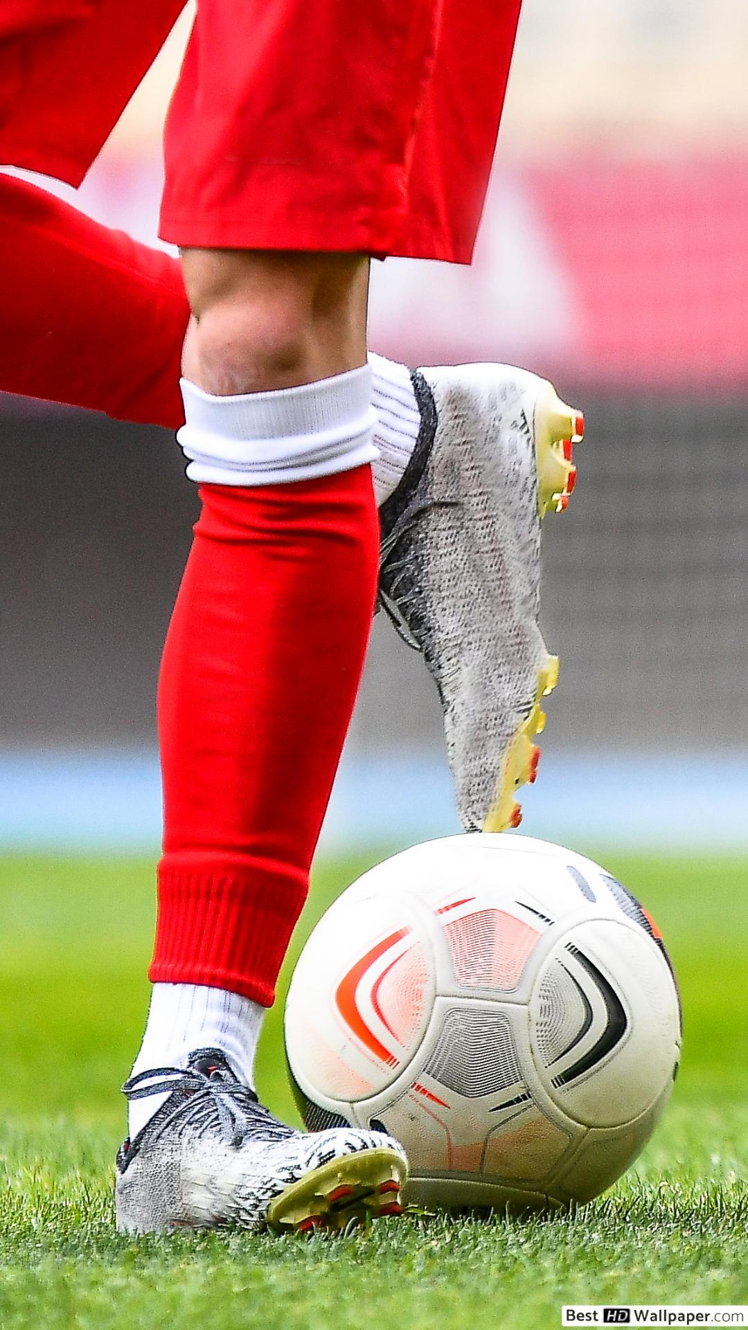 1080x1920 Football / Soccer player handling the ball HD wallpaper download