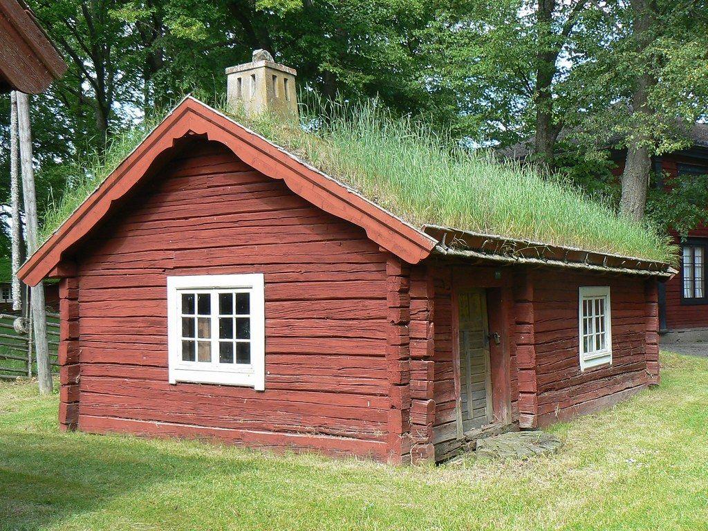 1024x768 Traditional red wooden house with green grass roof, Sweden
