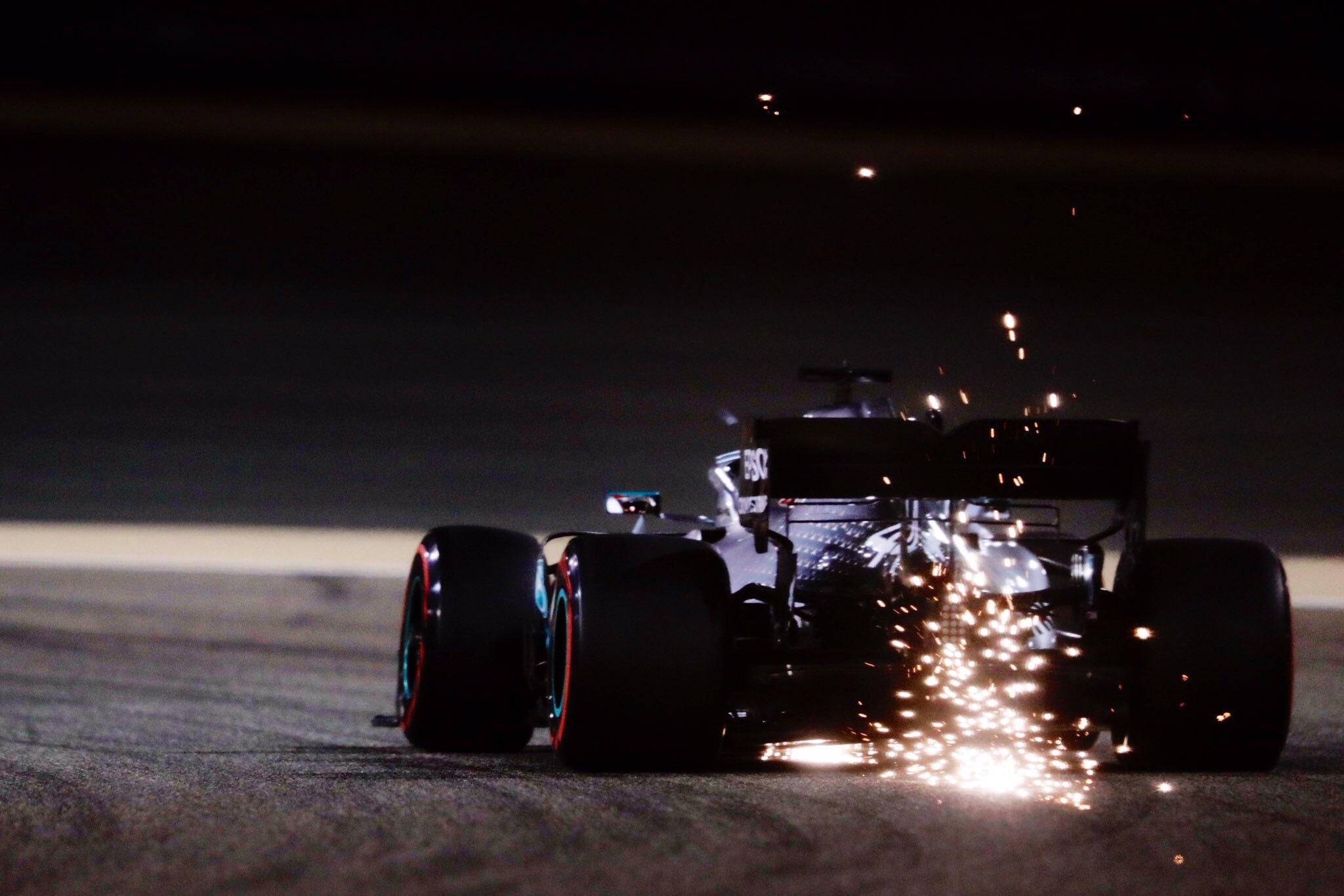 2048x1366 Mercedes F1 car sparking in the Bahrain night