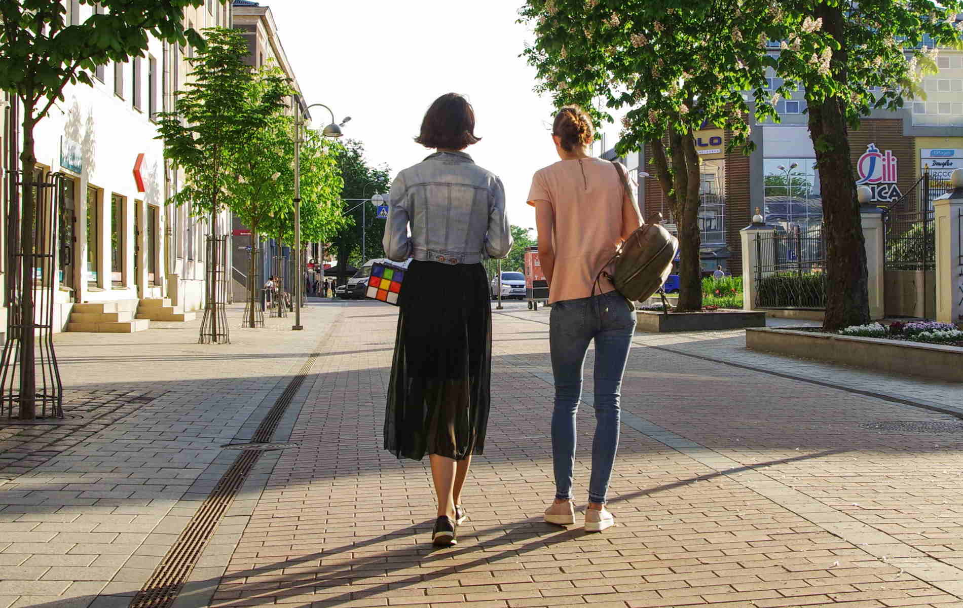 1900x1200 image Of Women Walking Away