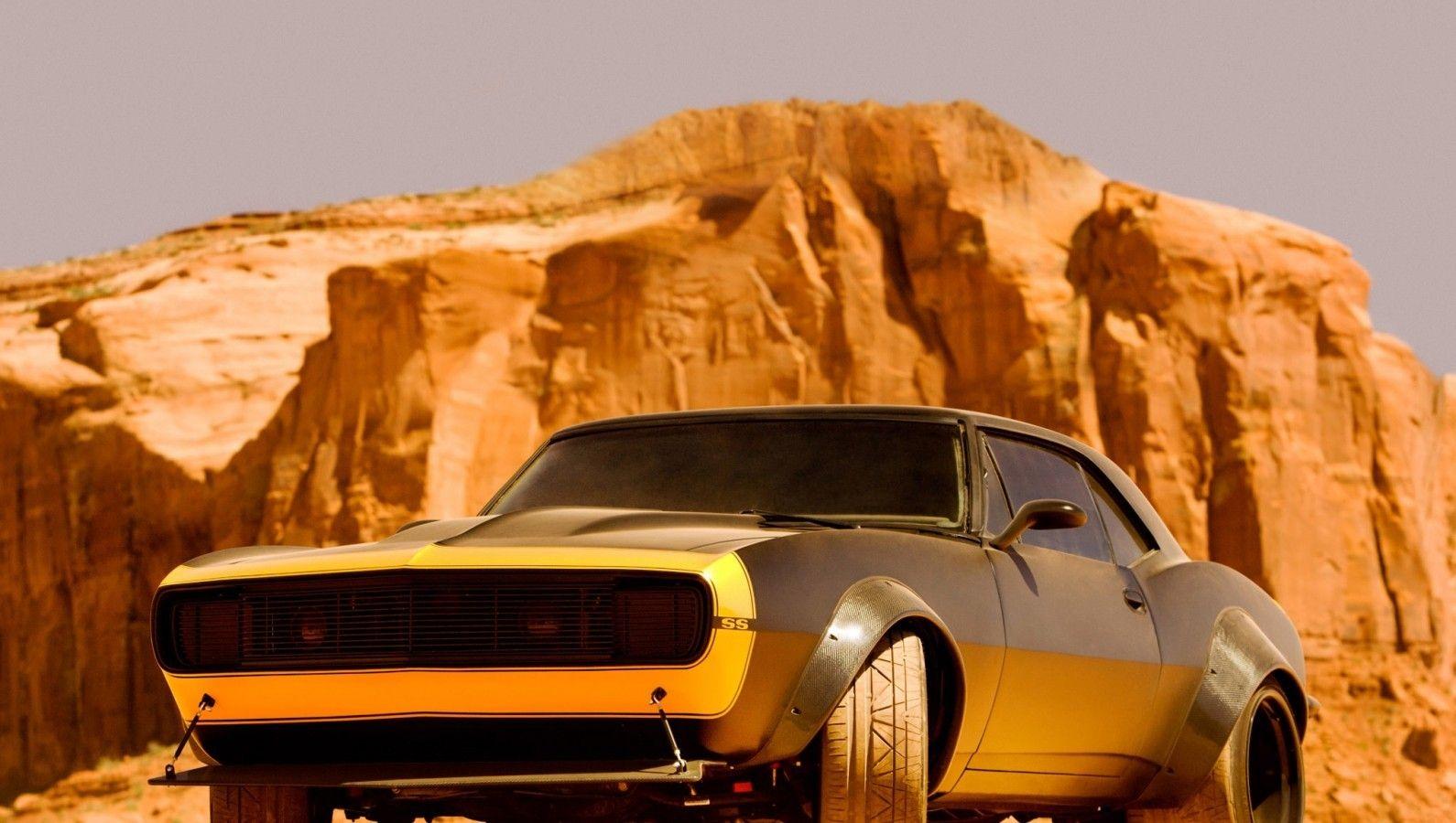 1590x900 Download 1590x900 Chevrolet Camaro Ss, Yellow, Front View, Classic, Cars Wallpaper