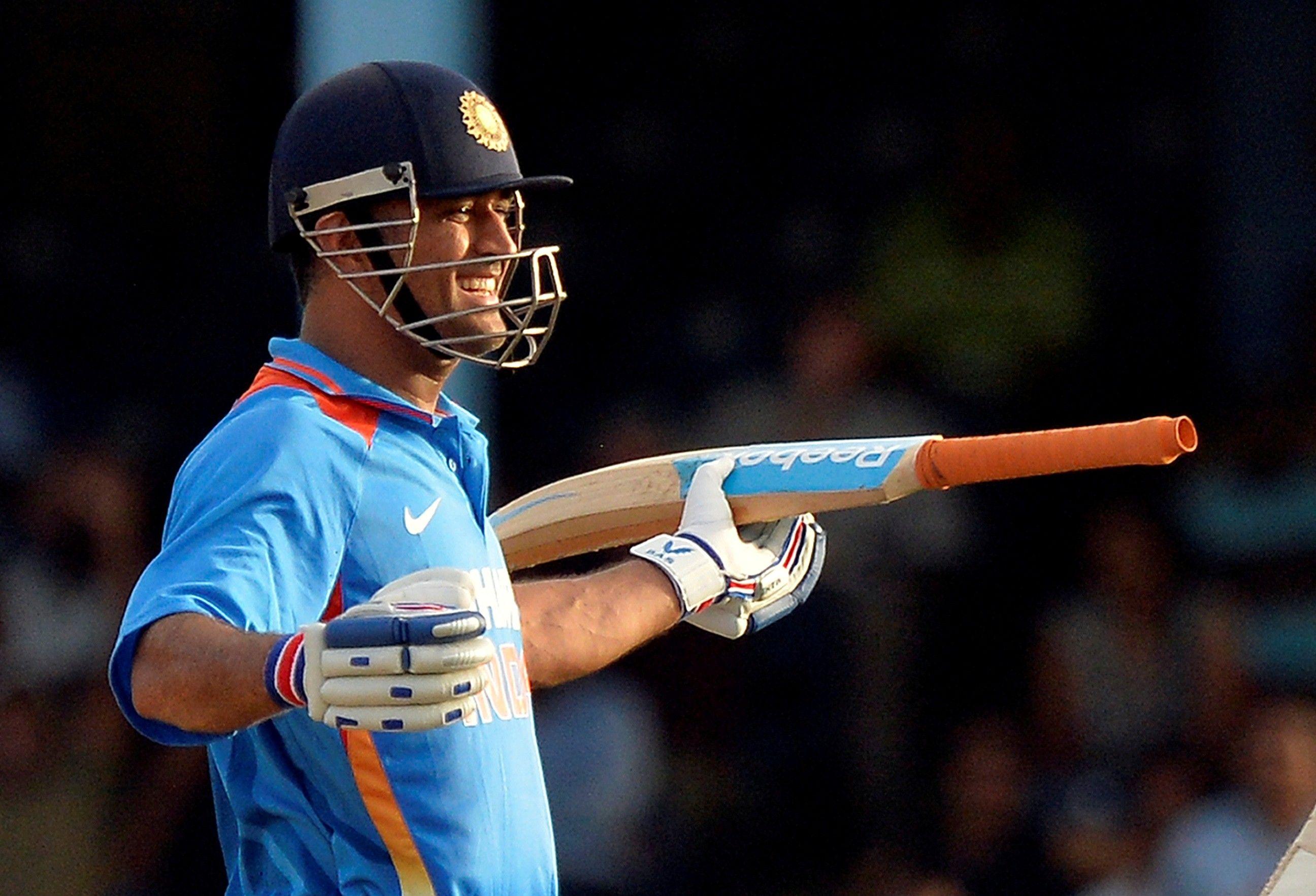 2592x1764 MS Dhoni Indian Captain Smilie in Ground Worldcup 2015 Cricket Image
