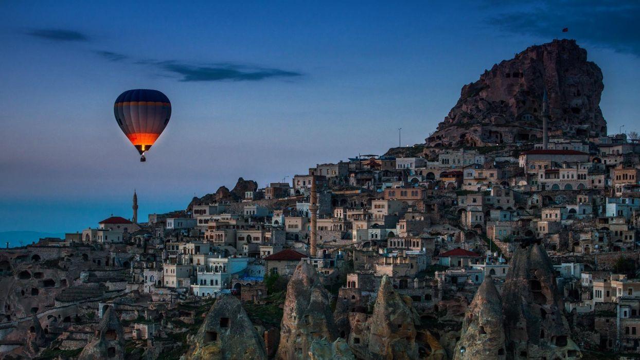 1244x700 Turkey balloon building castle city Cityscape clouds Evening Hot Air Balloons house landscape rock sky sunset wallpaperx1080