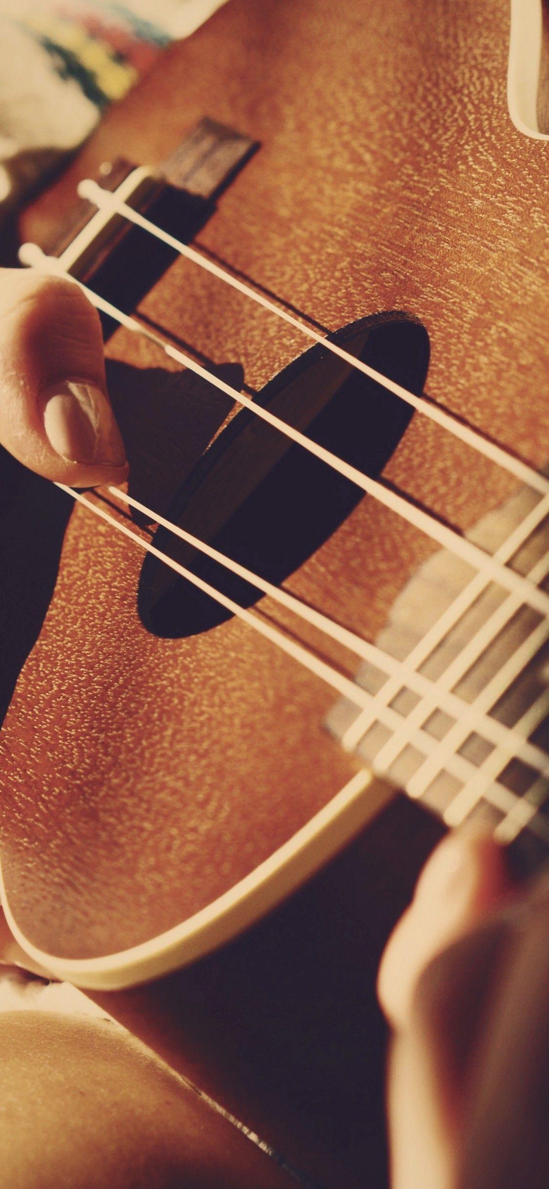 1125x2436 Download 1125x2436 Ukulele, Instrument, Music, Hand Wallpaper for iPhone X
