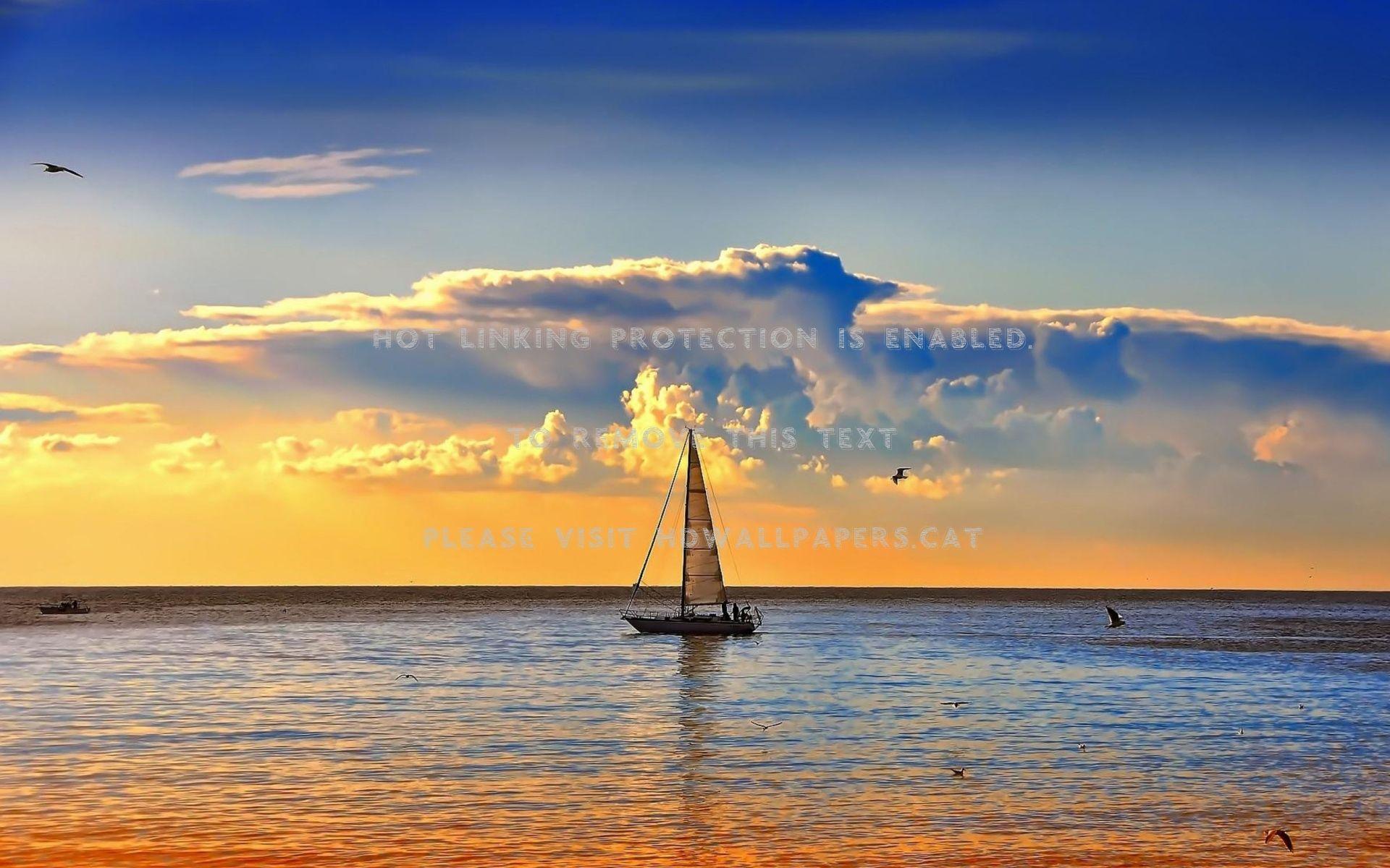 1920x1200 sailboat in calm sea clouds horizon sunset
