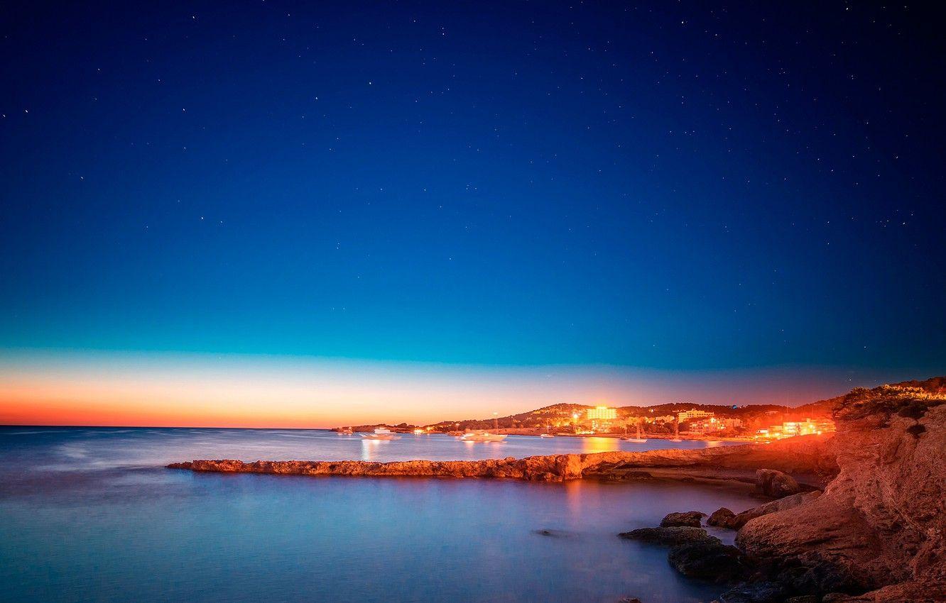 1332x850 Wallpaper sea, the sky, sunset, lights, stones, coast, home, yachts, stars, the evening, Spain, Ibiza, San Antonio image for desktop, section пейзажи