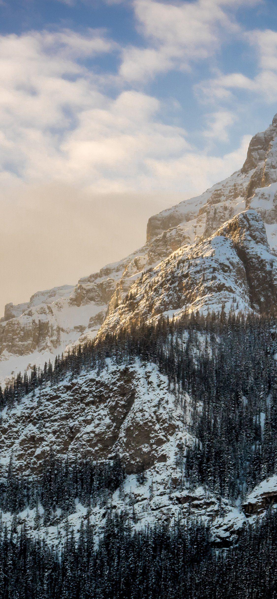 1125x2436 Mountain Snow Winter Cold Nature iPhone X Wallpaper Free Download