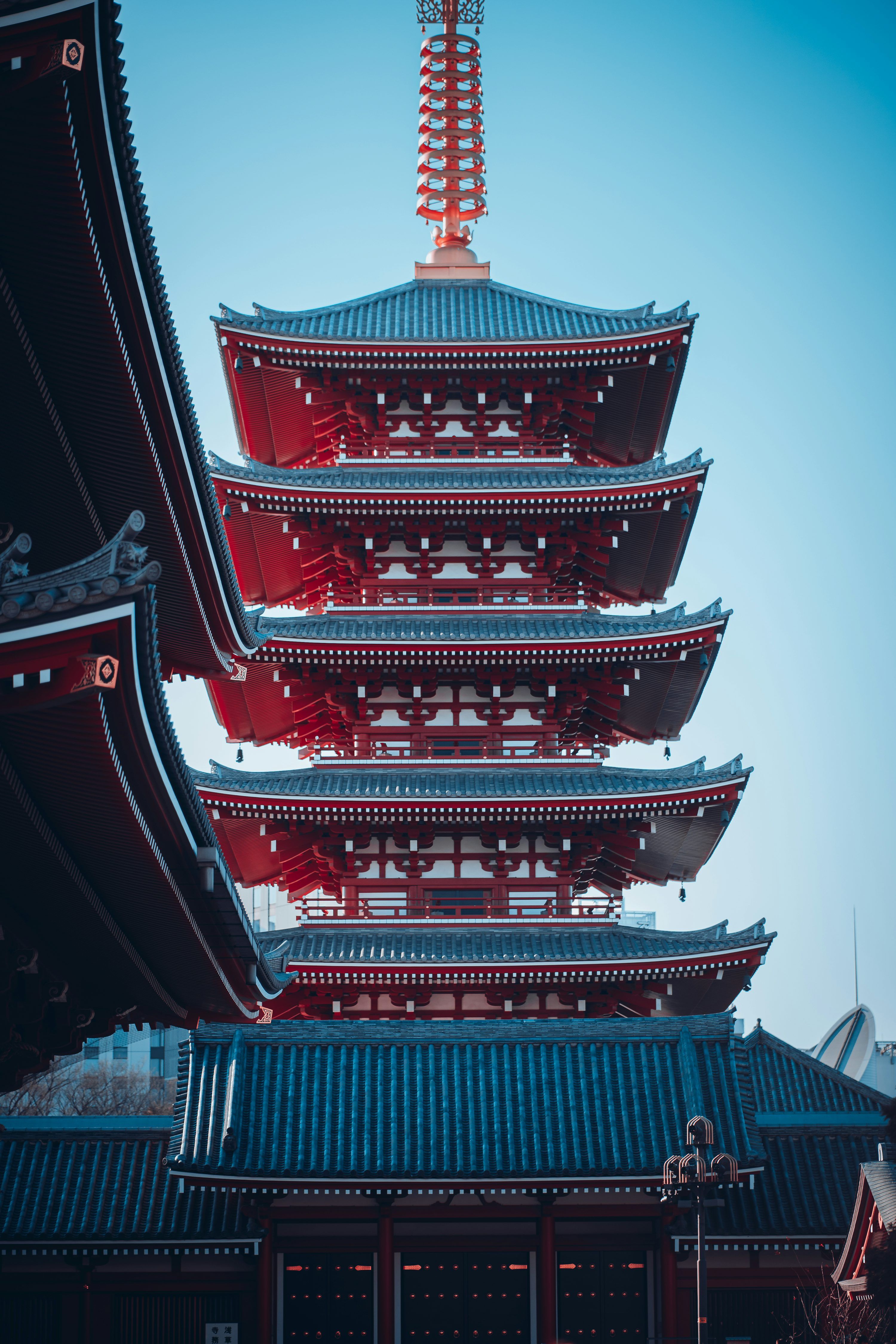3000x4500 A tall building with a tower in the middle of it photo