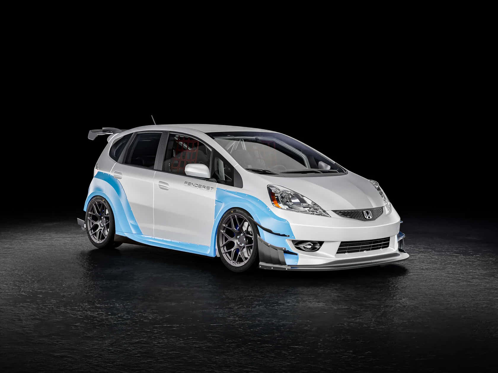 1680x1260 Download Sleek Silver Honda Fit on the road Wallpaper